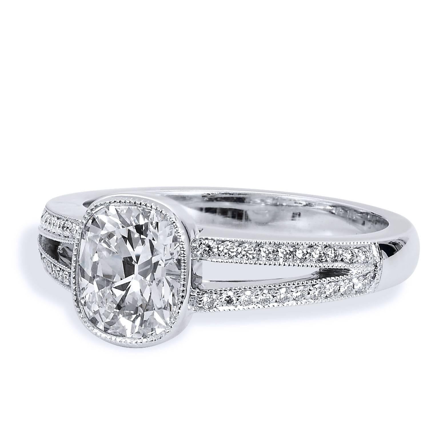 GIA Certified 1.07 Carat Brilliant Cushion Cut Diamond Split Shank Ring 

This engagement ring inspires the sentiment of a fairy tale. Featuring a 1.07 carat cushion brilliant cut diamond (J/SI2; GIA #2171010082) set at center and then an additional