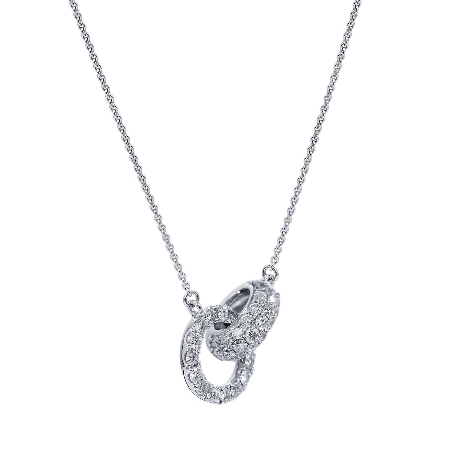 Two 18 karat white gold rings featuring 0.43 carat of pave set diamond (G/H/VS), interlock to form a charming pendant necklace.