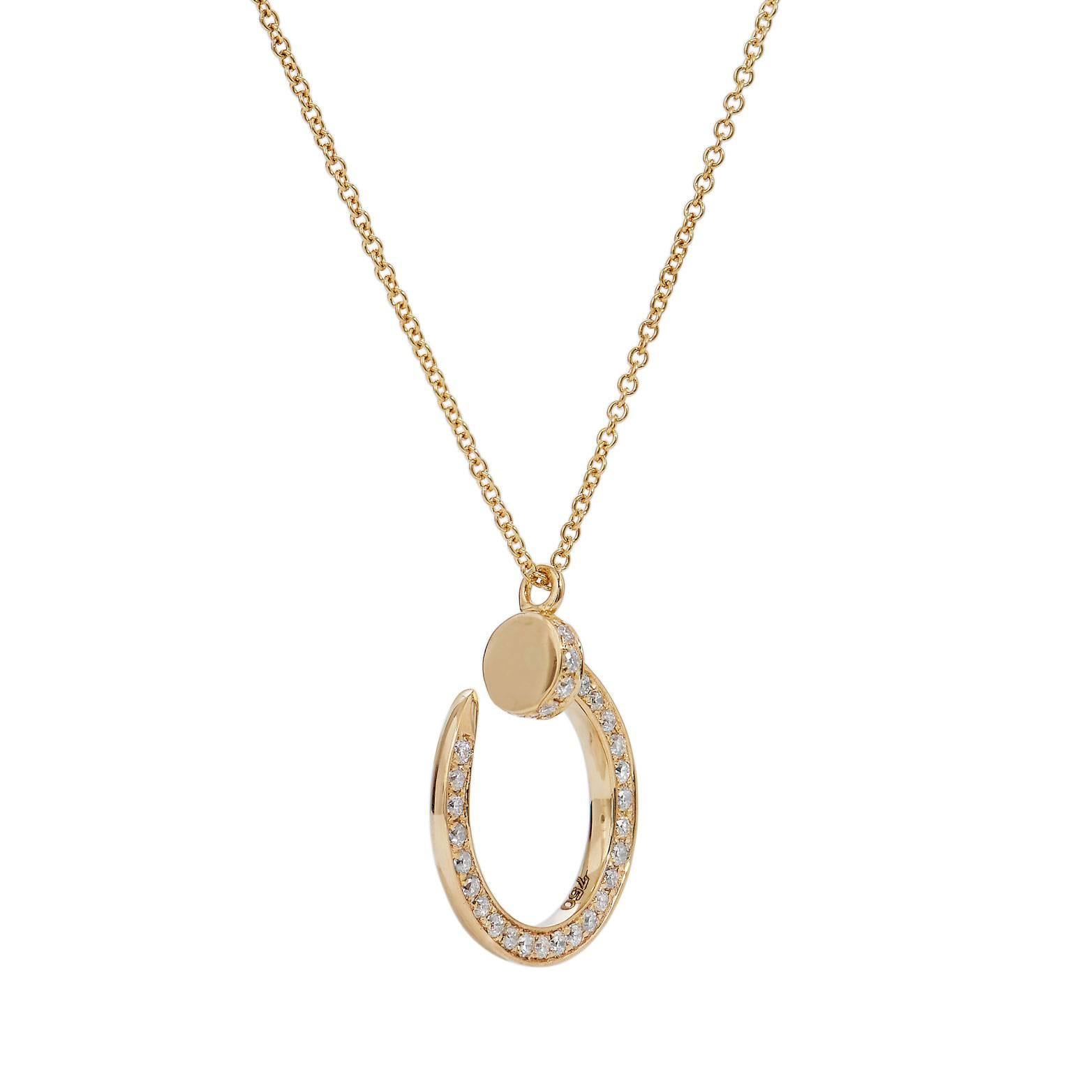 0.25 carat of pave-set diamond (G/H/VS), are affixed in a 16 millimeter curved nail design. Fashioned in 18 karat yellow gold and suspended from a white gold chain, this pendant necklace makes a tasteful statement.