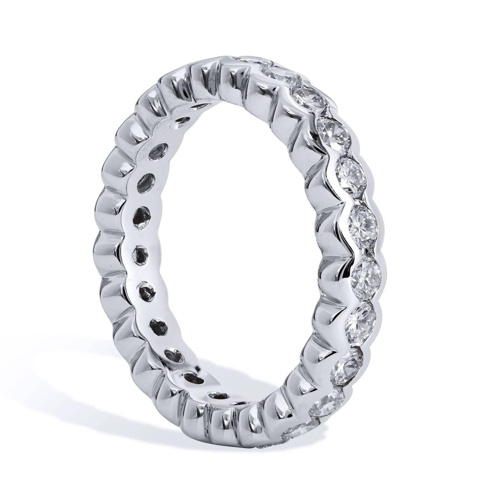 Platinum 1.65 carat Round Brilliant Cut Diamond Eternity Band Ring Size 6

Enjoy this previously loved platinum band ring featuring twenty-five round brilliant cut diamonds in channel setting.  
These 1.65 carat of diamonds pop with brilliant color