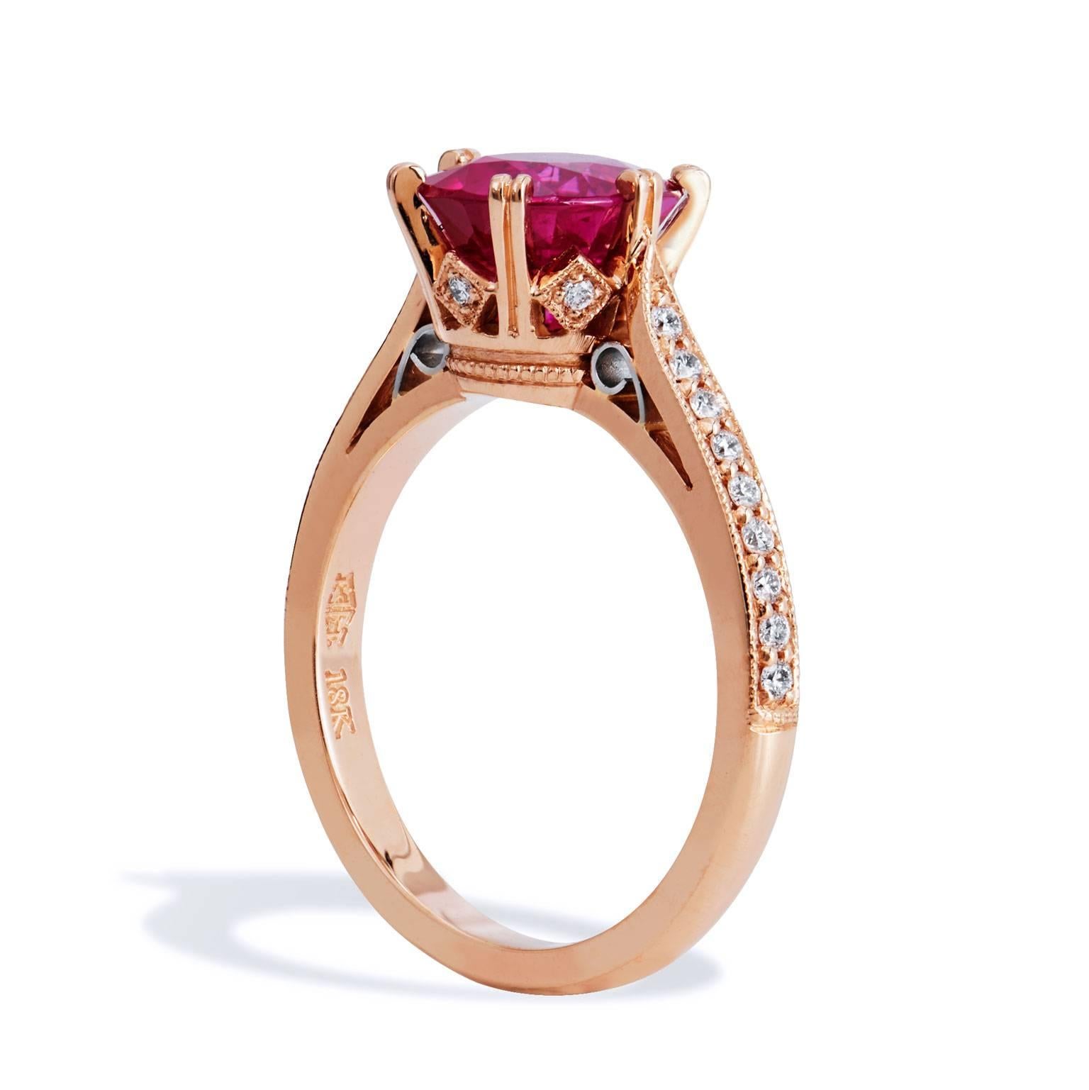 Handmade by H&H Jewels, features 18 karat rose gold as the base for this luscious vivid red Burma ruby and diamond ring. 

The prong-set center ruby is highlighted by 0.13 carat of pave set diamond (F/VS1) trailing down the shank, with an additional