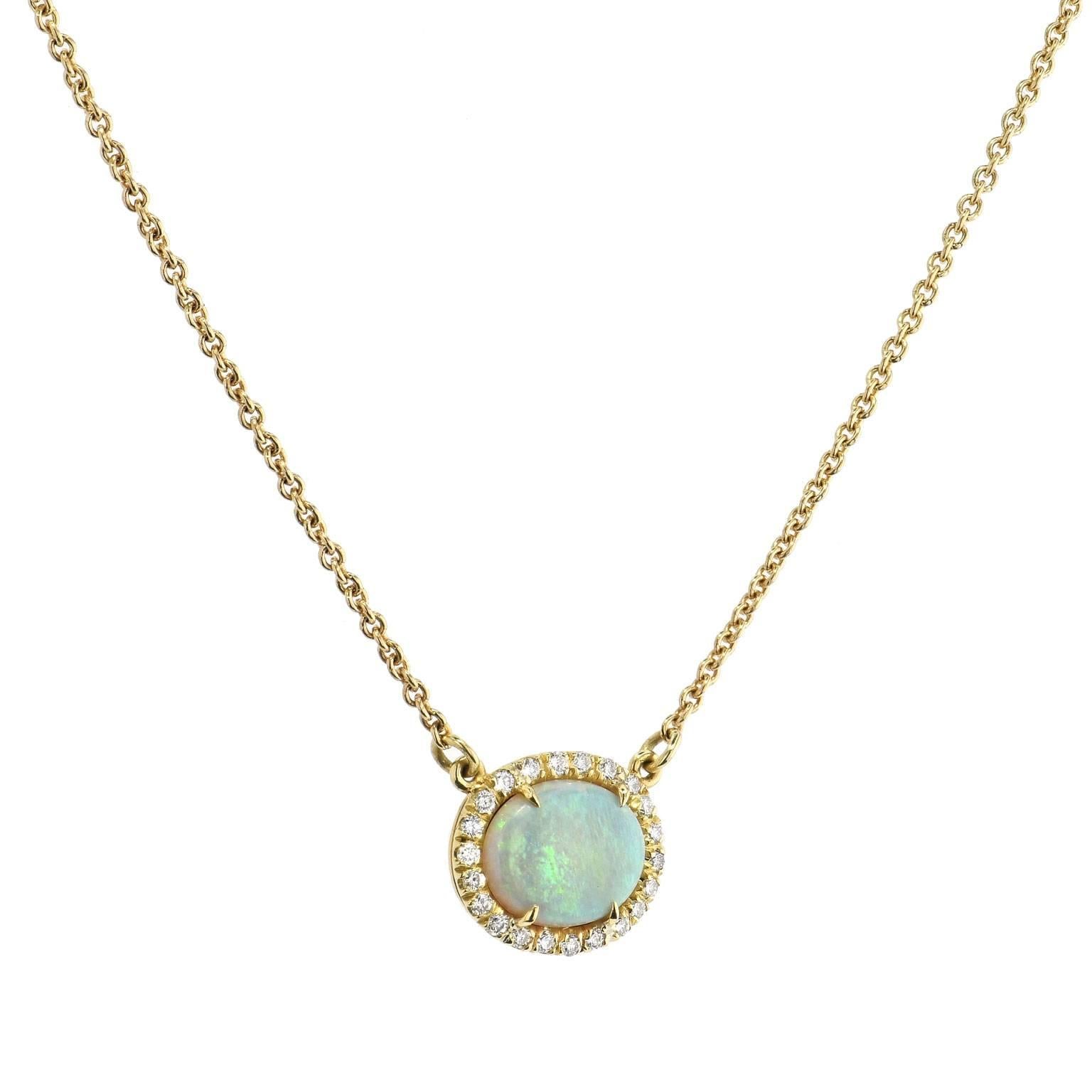 Australia is one of the best bearers of the radiant opal. Handcrafted by H, this 18 karat yellow gold pendant necklace features a luminous 0.92 carat Australian Opal at center and is embraced by 0.14 carat of diamond in halo (G/H/SI1). Strung on an