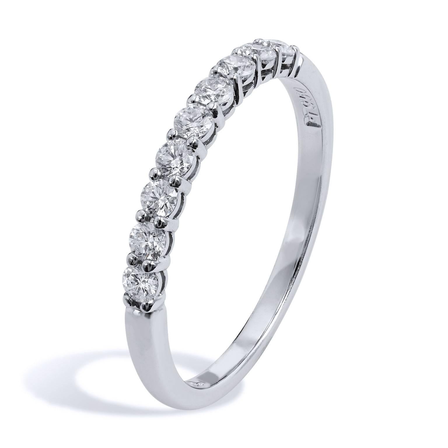 Pristine beauty resonates with this previously loved Tiffany & Co. platinum band ring featuring nine round diamonds with at total weight of 0.27 carat of pave-set diamond (size 6).