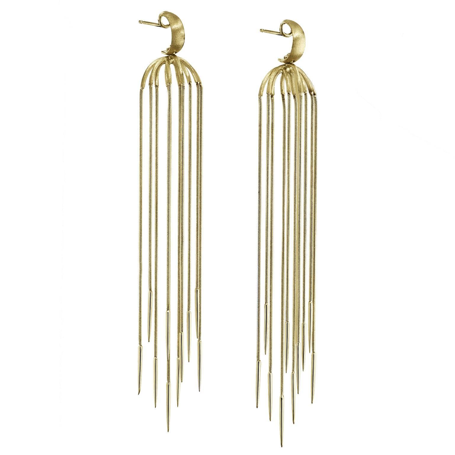 Fashioned in 18 karat yellow gold, these multi-chain spike design dangle earrings epitomize flirty fun.