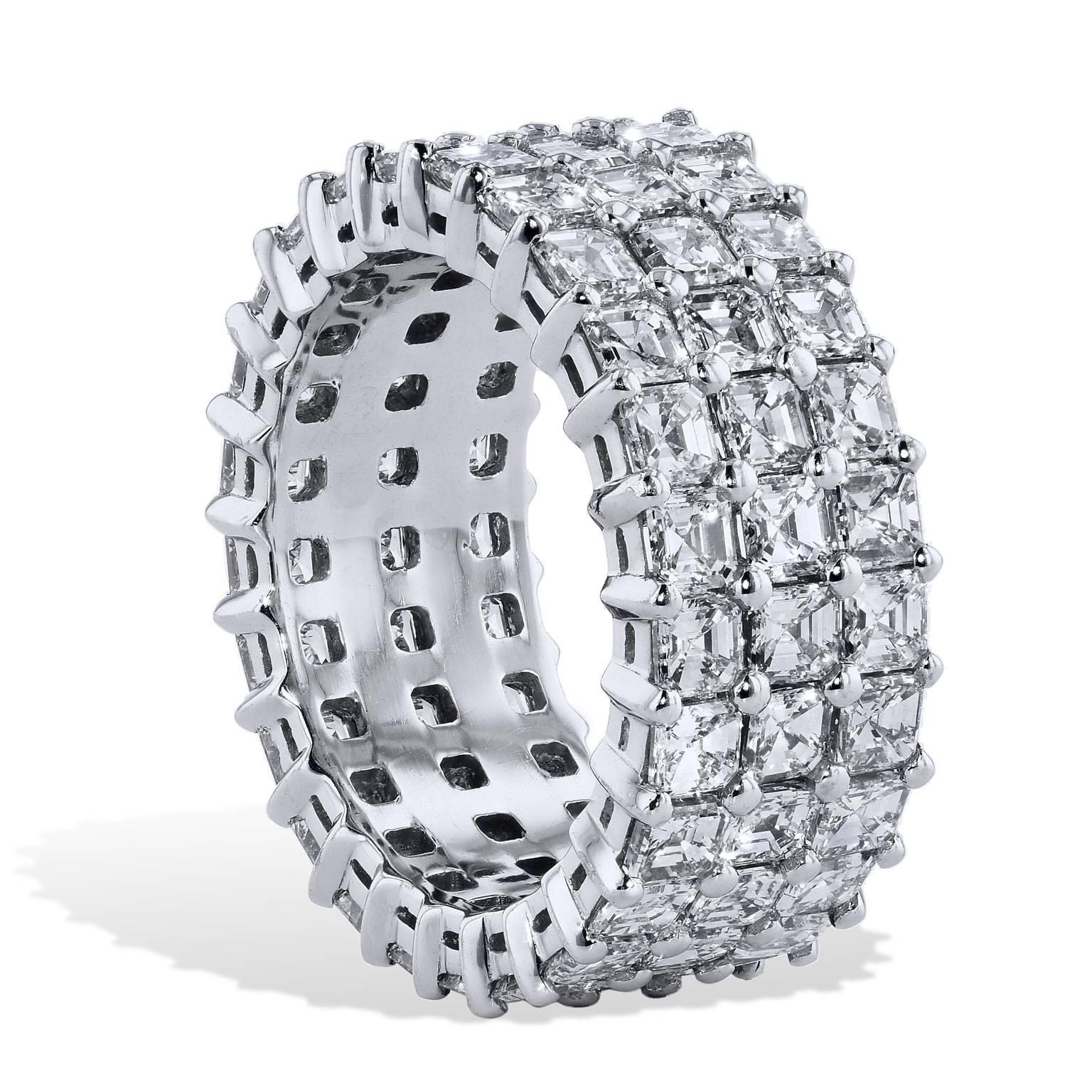 This triple row asscher cut diamond eternity band with double basket fashioned in platinum with shared prong will stir and illuminate the essence of her beauty. A symbol of never-ending love, this 6.43 carat (G/H/VS) eternity band will set her heart