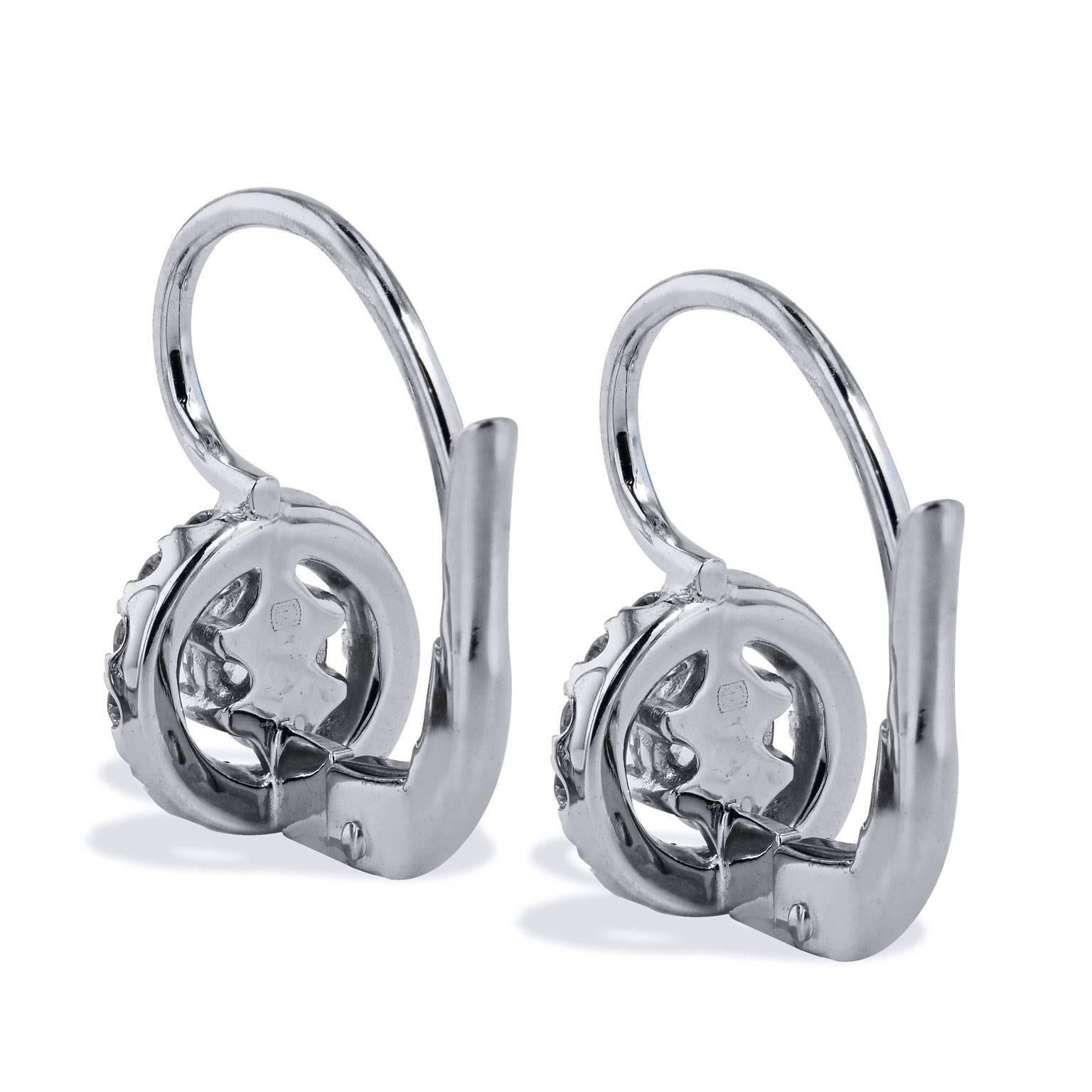Make these previously loved lever-back earrings yours. These swank earrings epitomize elegance and are essential for the woman who likes a little glamour. Two diamonds with a total weight of 0.40 carat (G/H/VS2/SI1) are prong- set with a surrounding