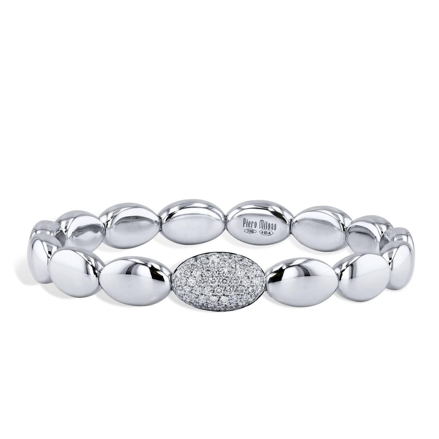 Bracelet with 18 karat white gold bean-shaped beads with white gold oval embellishment featuring 0.56 carat of pave-set diamond and titanium stretch insert.