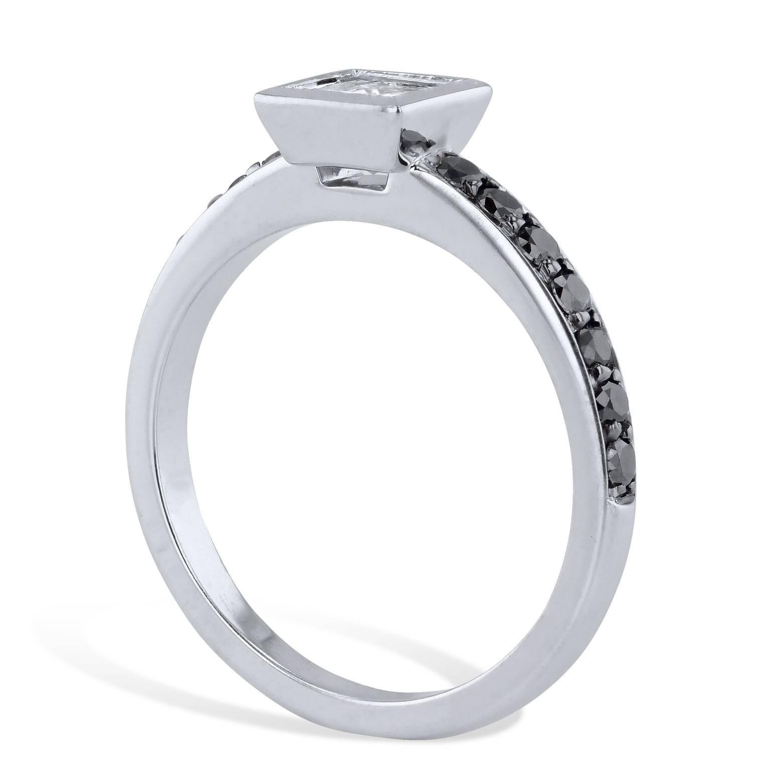 0.58 Carat Princess Cut Diamond with Black Diamond Pave Engagement Ring Size 6.5

Black and white diamonds, like keys of piano playing a melody that guides you straight to her heart, come together in this handmade 14 karat white gold engagement