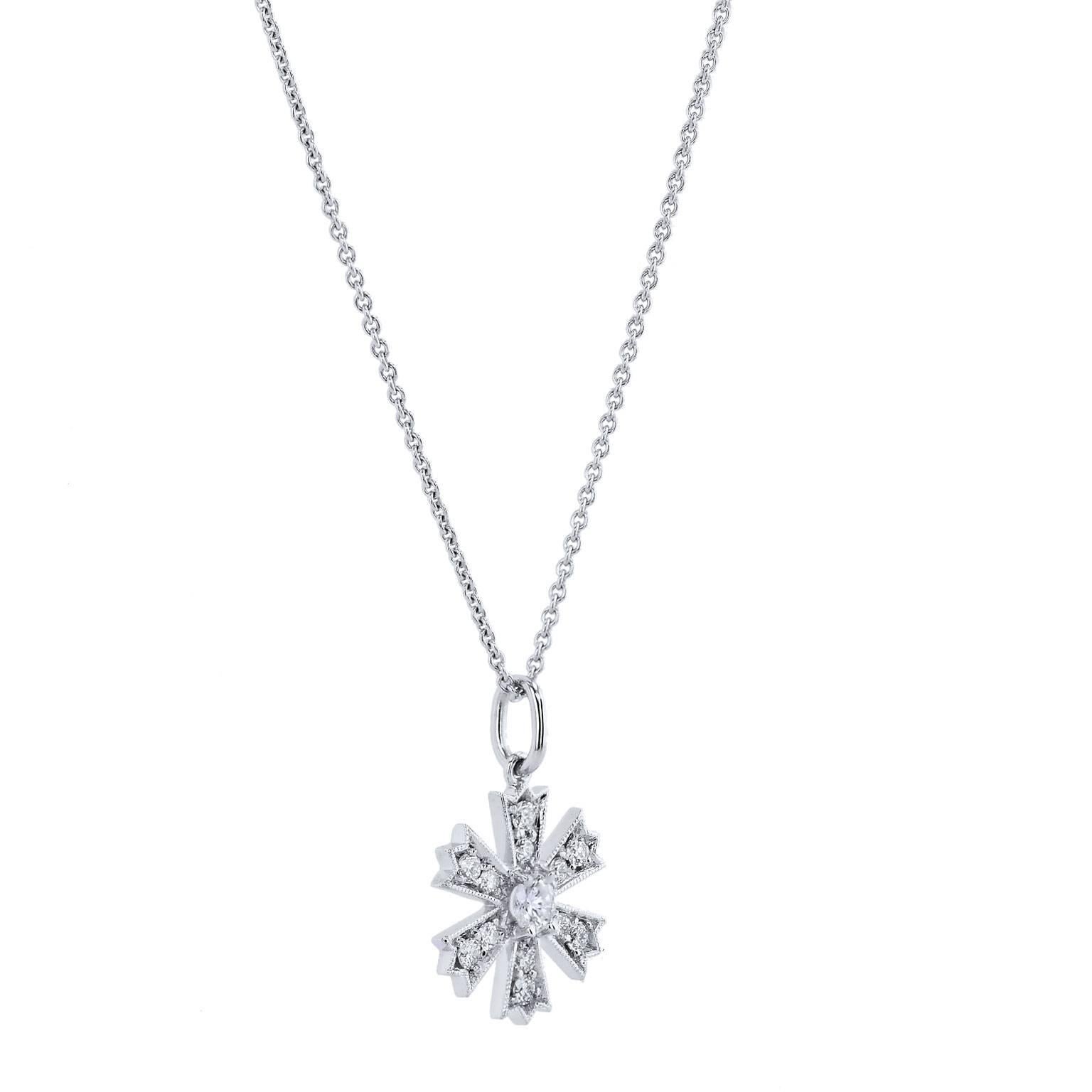 0.25 Carat Diamond Pave Flower Pendant 18 Karat Gold (Pendant only)

0.25 carat of pave-set diamond (G/H/VS) accentuate this handmade 18 karat white gold flower pendant with milgrain work. 
Let this tiny treasure become an everyday favorite.  The