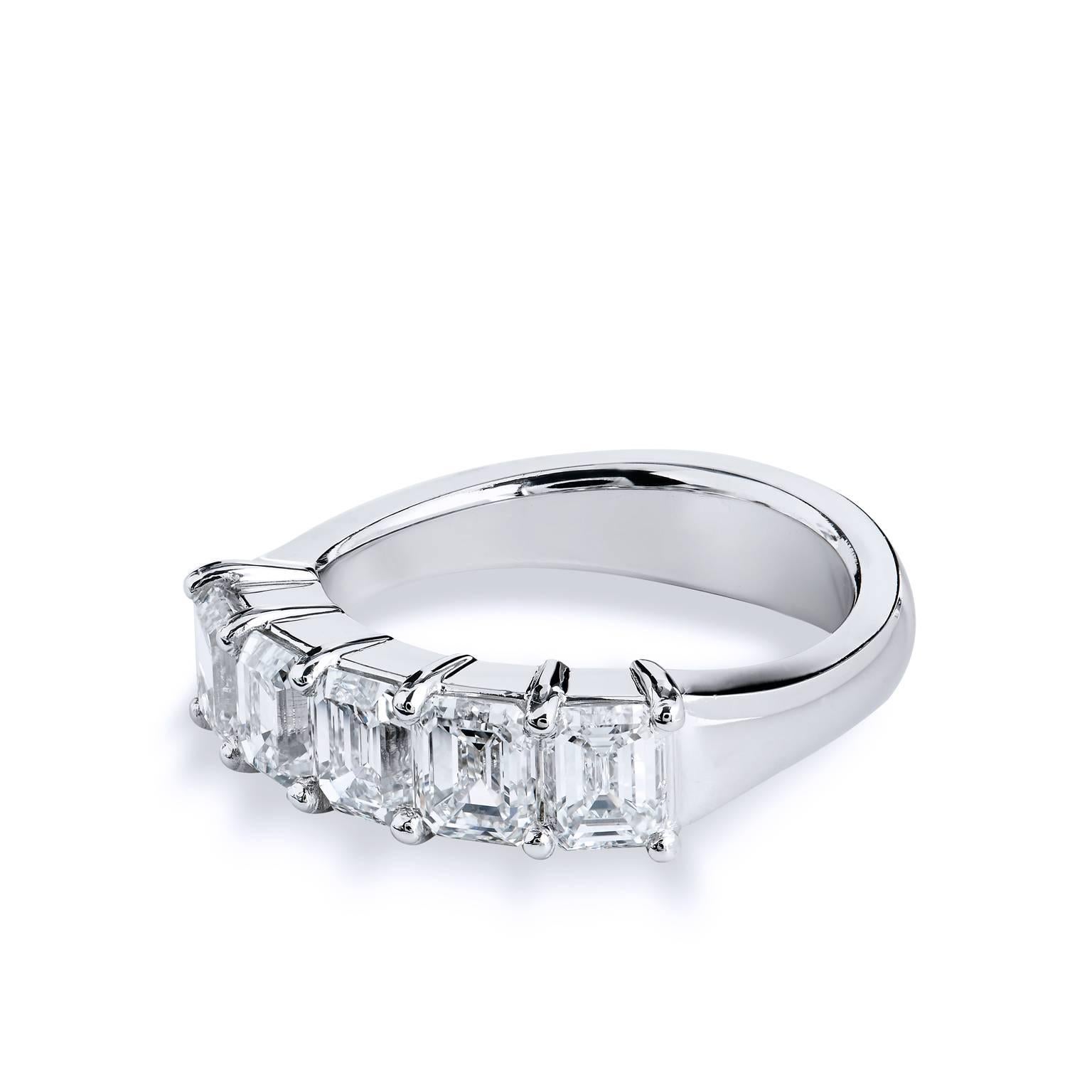 Handmade 2.25 Carats Emerald Cut Diamonds set in a Platinum Band Ring Size 6.25 

This H&H Jewels handmade band ring features 2.52 carat of emerald cut prong set diamonds (D/E/F/WS2). 
They are affixed to a platinum band. 

This ring provides a