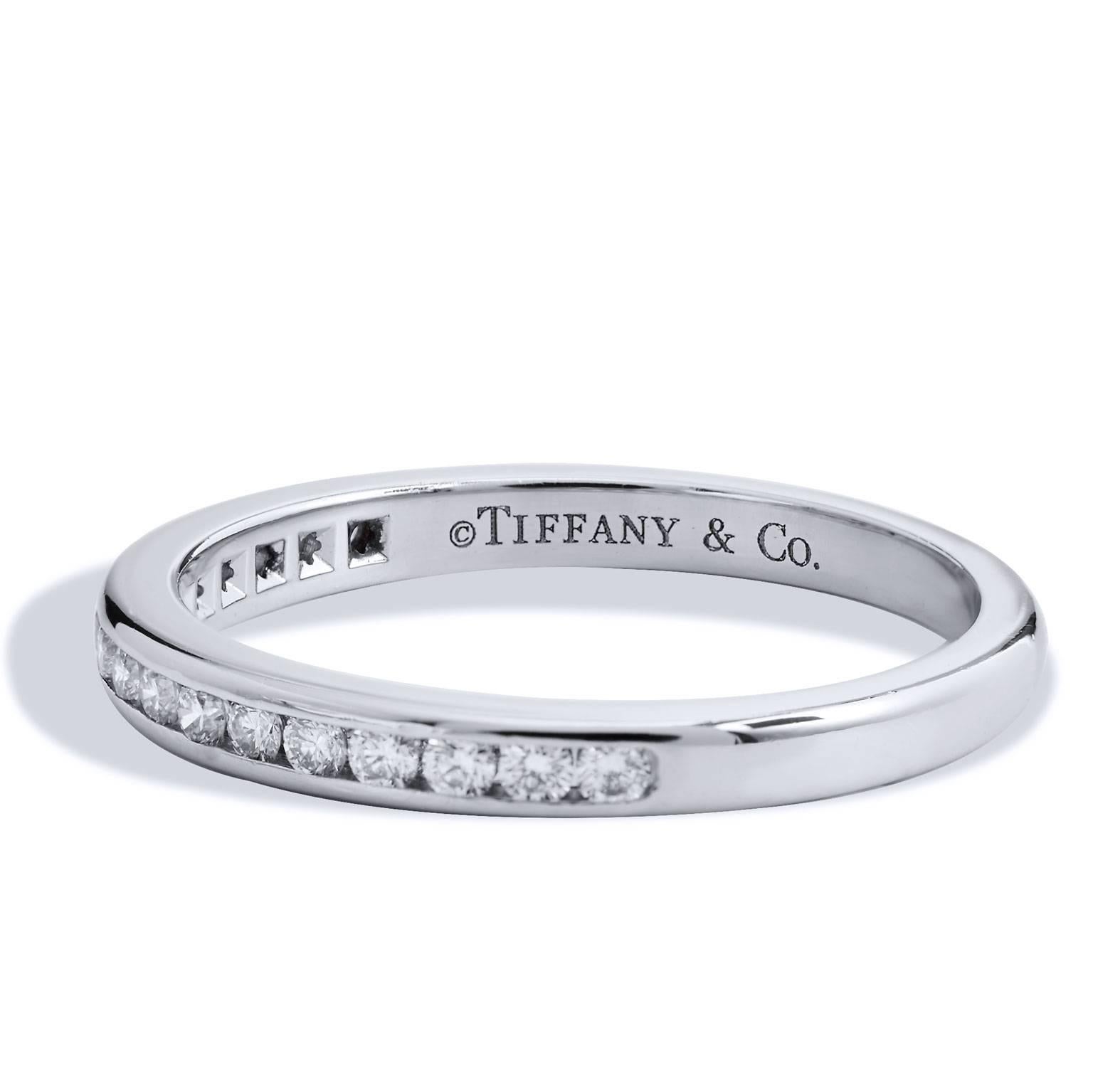 Estate Tiffany & Co. 0.17 Carat Diamond and Platinum Eternity Band Ring Size 5.5

Enjoy this previously loved Tiffany & Co. band ring featuring 17 channel set diamonds with a total weight of 0.17 carat and affixed to a 2 millimeter platinum band