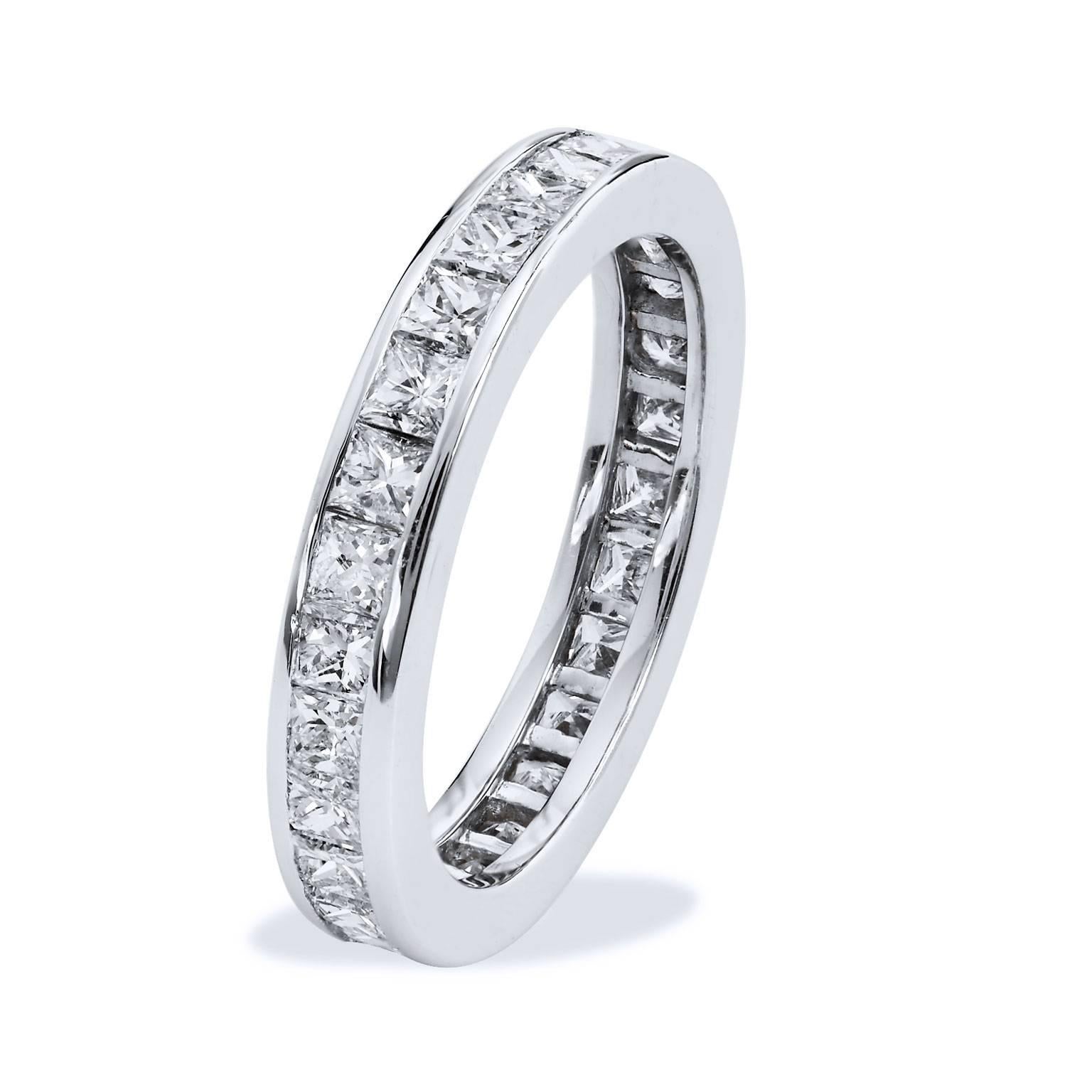 Enjoy this previously loved 14 karat white gold band ring featuring 3.00 carat of channel set princess cut diamonds. 
