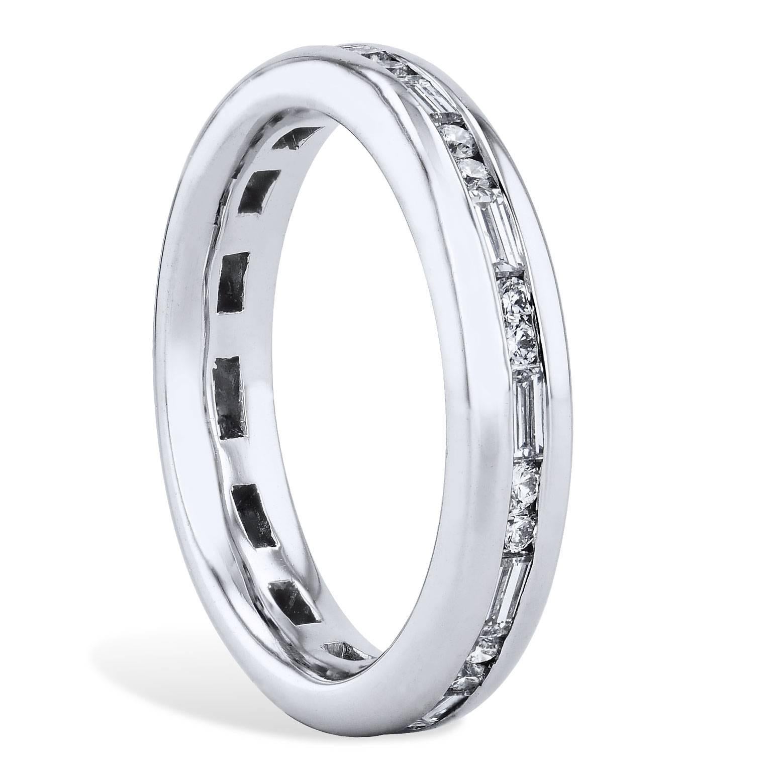 H&H Round Cut and Baguette Cut Diamond Satin Finish Eternity Band Ring

This ring has twenty-two round brilliant cut diamonds and eleven baguette cut diamonds totaling 0.30 carat of round (F/G/VS1) and 0.52 carat of baguette diamonds.  These