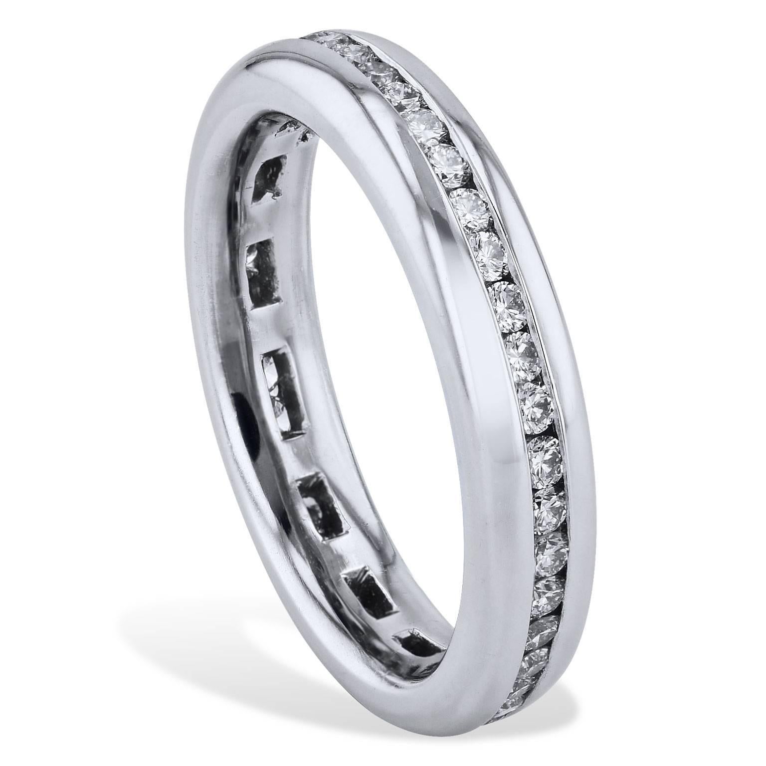 This handmade diamond eternity band ring features 0.64 carat of round brilliant cut channel set diamond. (F/G/VS1). Fashioned in platinum with satin finish, this ring reflects a marvelous display of color and light.