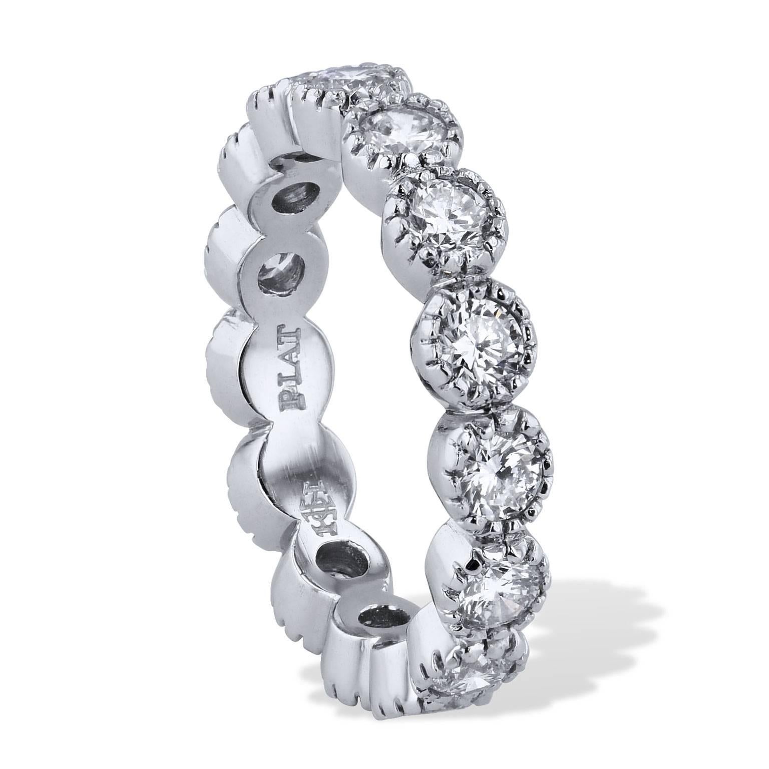 H & H 1.78 Carat Ten Prong Diamond Eternity Band Wedding Ring

This ring is a handmade, one of a kind design by H&H Jewels. 
It features 1.78 carats of round diamonds that are ten-prong set in a platinum band ring (F/G/VS). 

Size 6.25