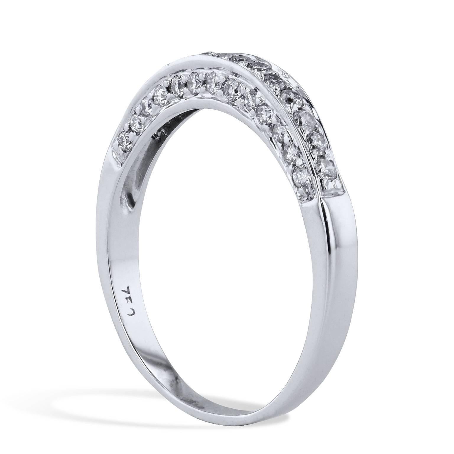 Estate 0.40 Carat Diamond Band Ring in 18 Karat White Gold

Enjoy this previously loved 18 karat white gold band ring featuring forty pave set round diamonds with a total weight of 0.40  carat (H/I/SI3). 
This estate ring is in excellent condition.  