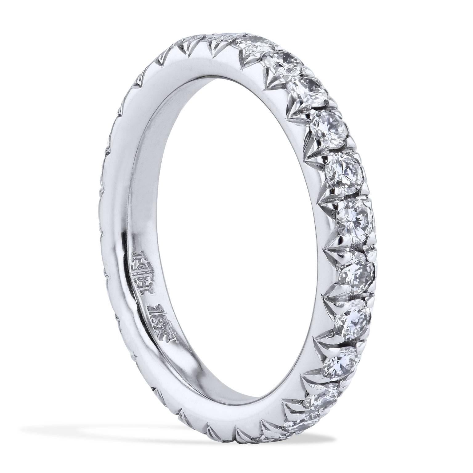 This handcrafted diamond eternity band ring features 1.00 carat of pave-set diamond (G/H/VS2) fashioned in 18 karat palladium with a split V detail that opens the eye, and allows the ring to pop with light.