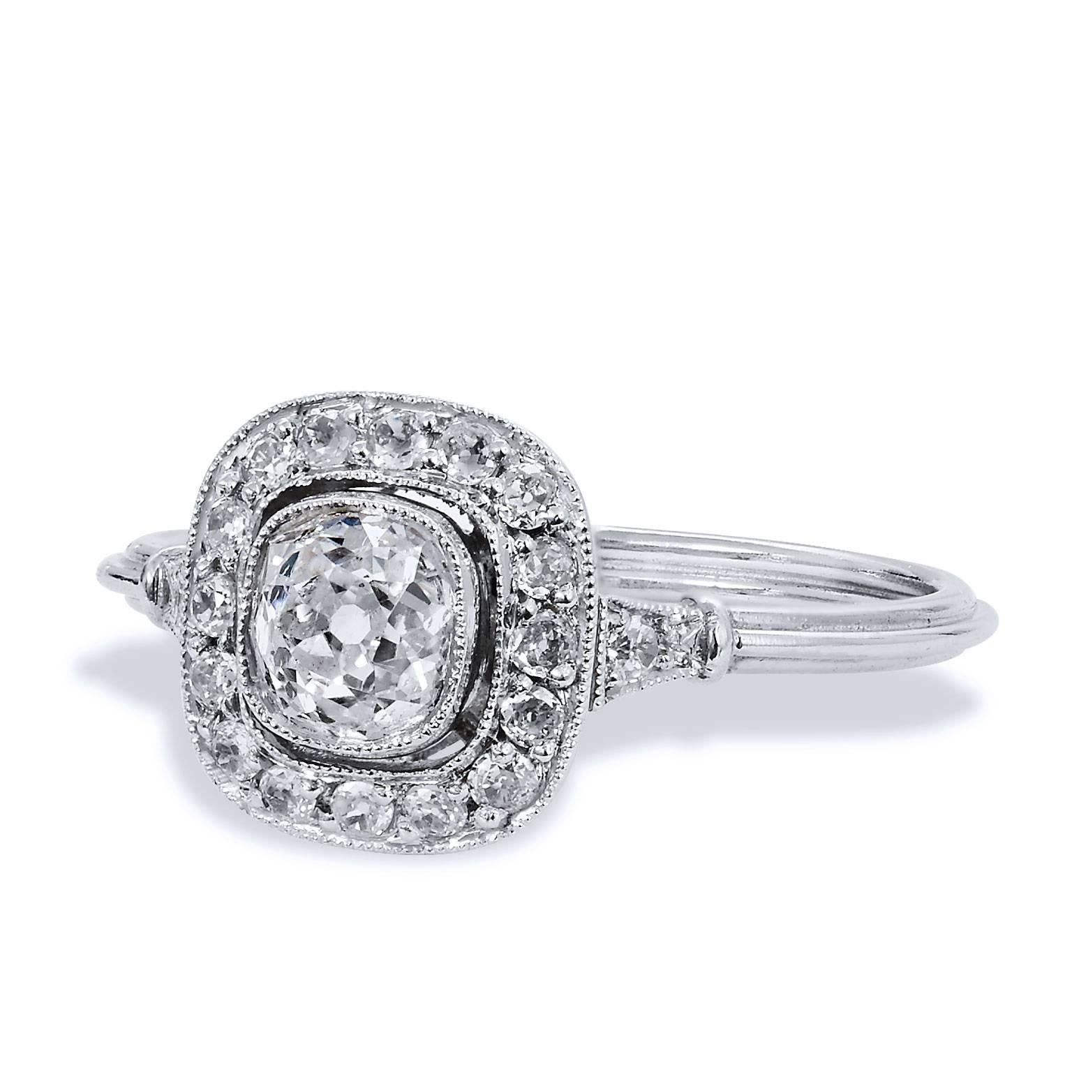 Art Deco Style Old Mine Cut 0.73 Carat Diamond Platinum Halo Engagement Ring

Create a shimmer and shine that she will adore with this Art Deco-style platinum engagement ring. Eighteen pieces of pave set diamonds in halo, with a total weight of 0.23