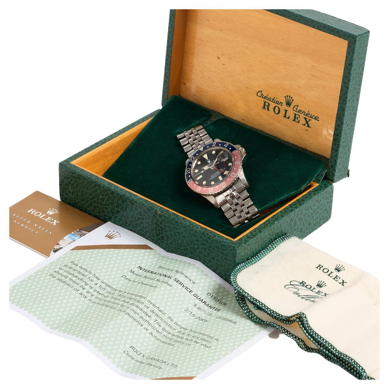 Rolex GMT Master Watch Ref 1675, "Pepsi' Dial, Circa 1973. Service Papers.