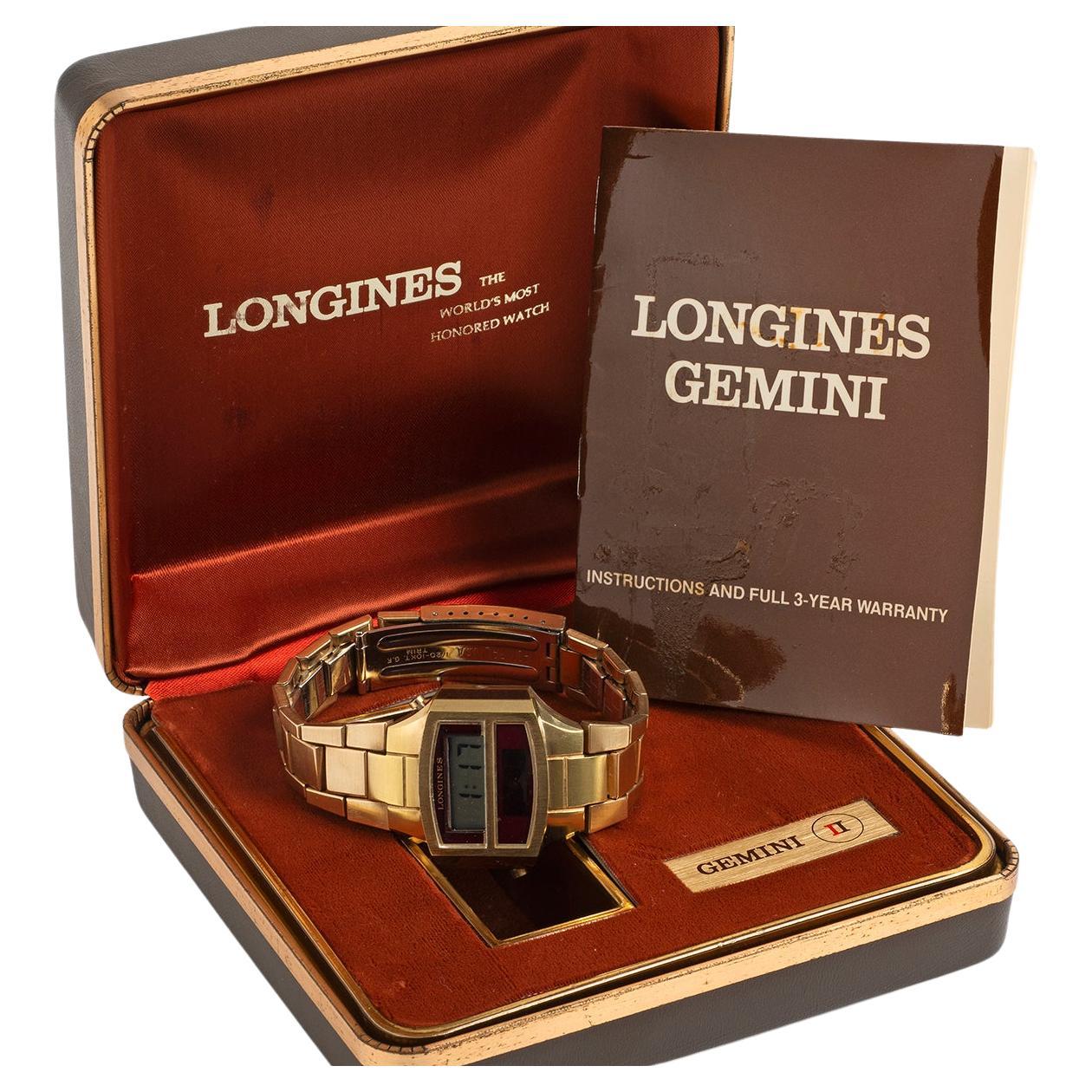 Our extremely rare and complete vintage Longines Gemini II features a 35.4 mm case and bracelet in heavy gold plated steel. The Gemini by Longines was the first watch to simultaneously provide a digital time readout in day and night, as the lower
