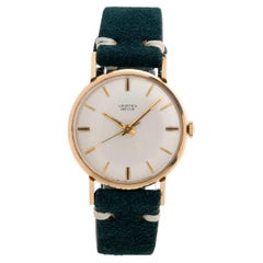 Vertex Revue Vintage Dresswatch, 9K Yellow Gold, Manual, 34" Case. Year 1970.