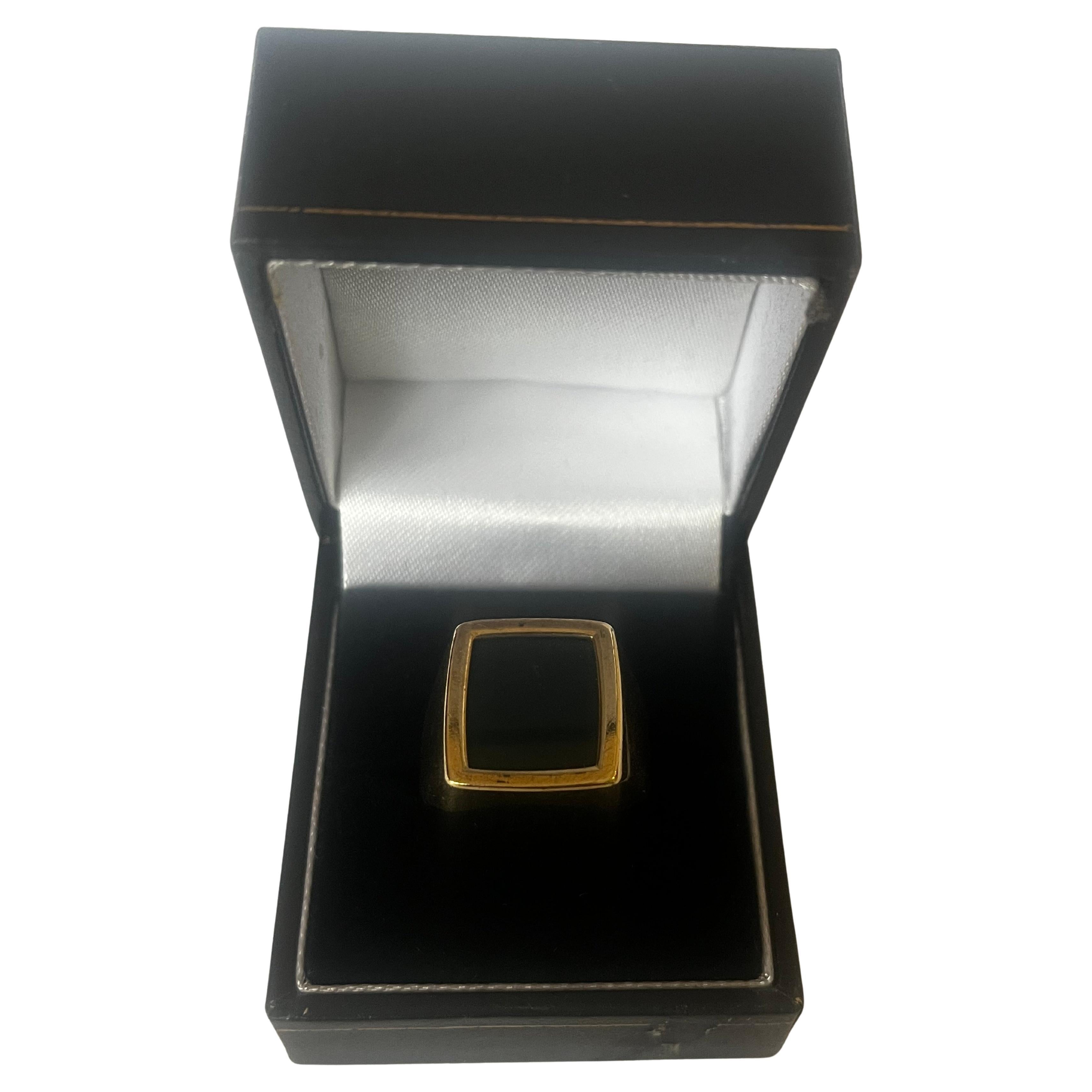 Our 1970's black blood stone signet ring, is set in 9 carat yellow gold.  Suitable for a man or woman, this ring comes in size US size 8.5 / UK size R.  This ring weighs 8.05 grams.