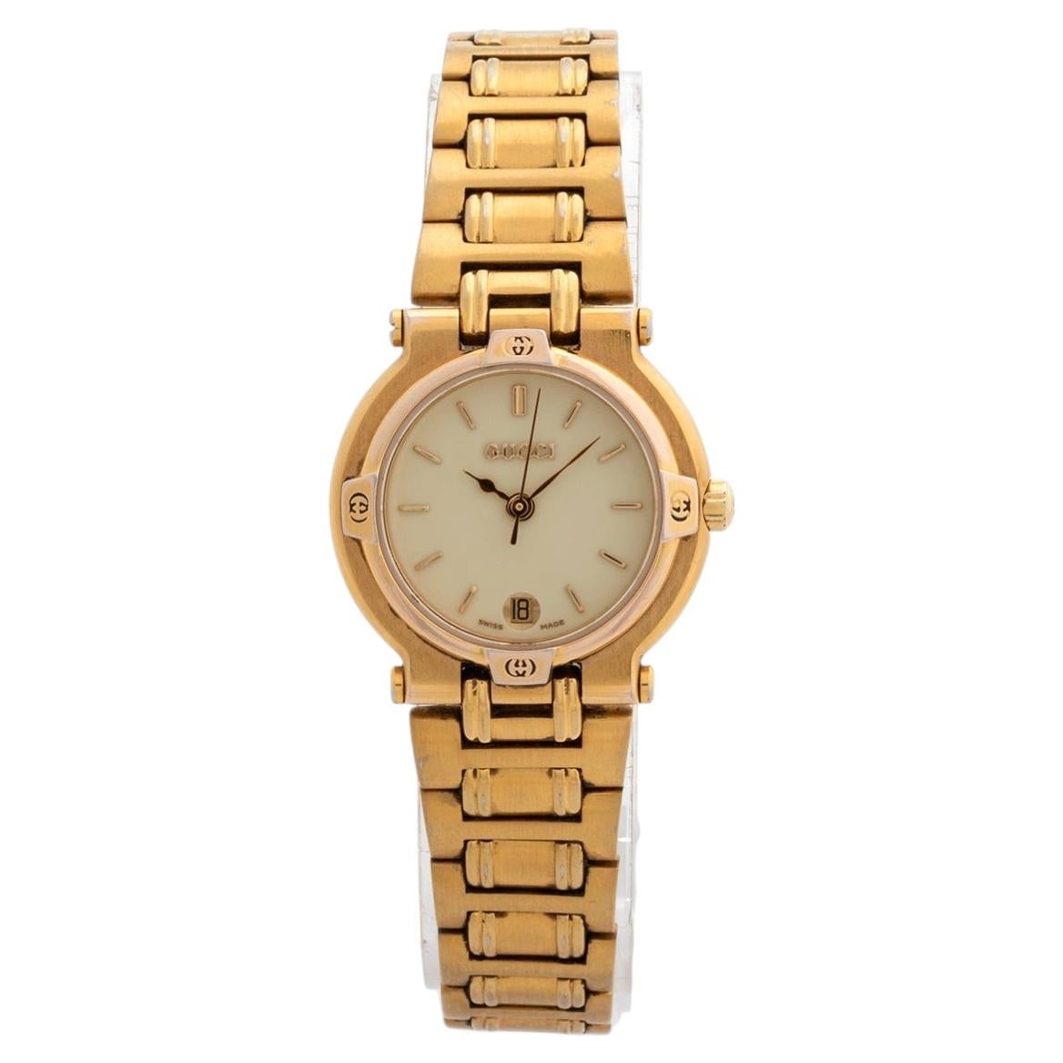 Gucci ladies, reference 9200L, features a gold plated 25mm case / bracelet 1993 For Sale