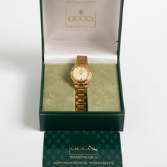 Gucci ladies, reference 9200L, features a gold plated 25mm case / bracelet 1993