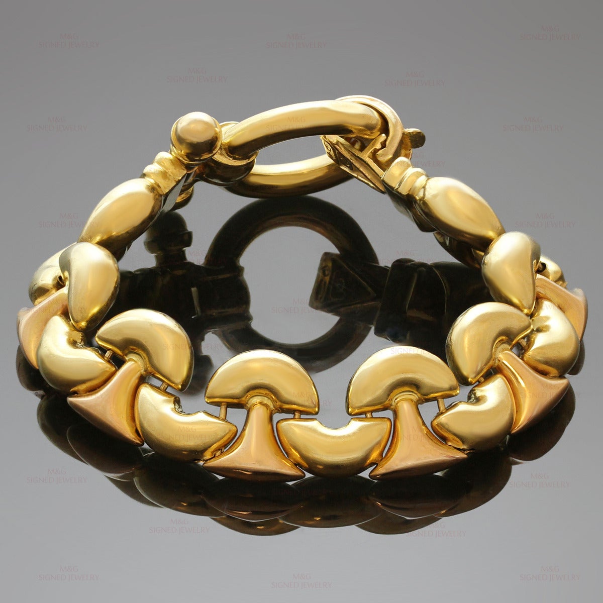 This classic Italian bracelet features geometric links made in 18k yellow gold and completed with a toggle clasp. Measurements: 0.59