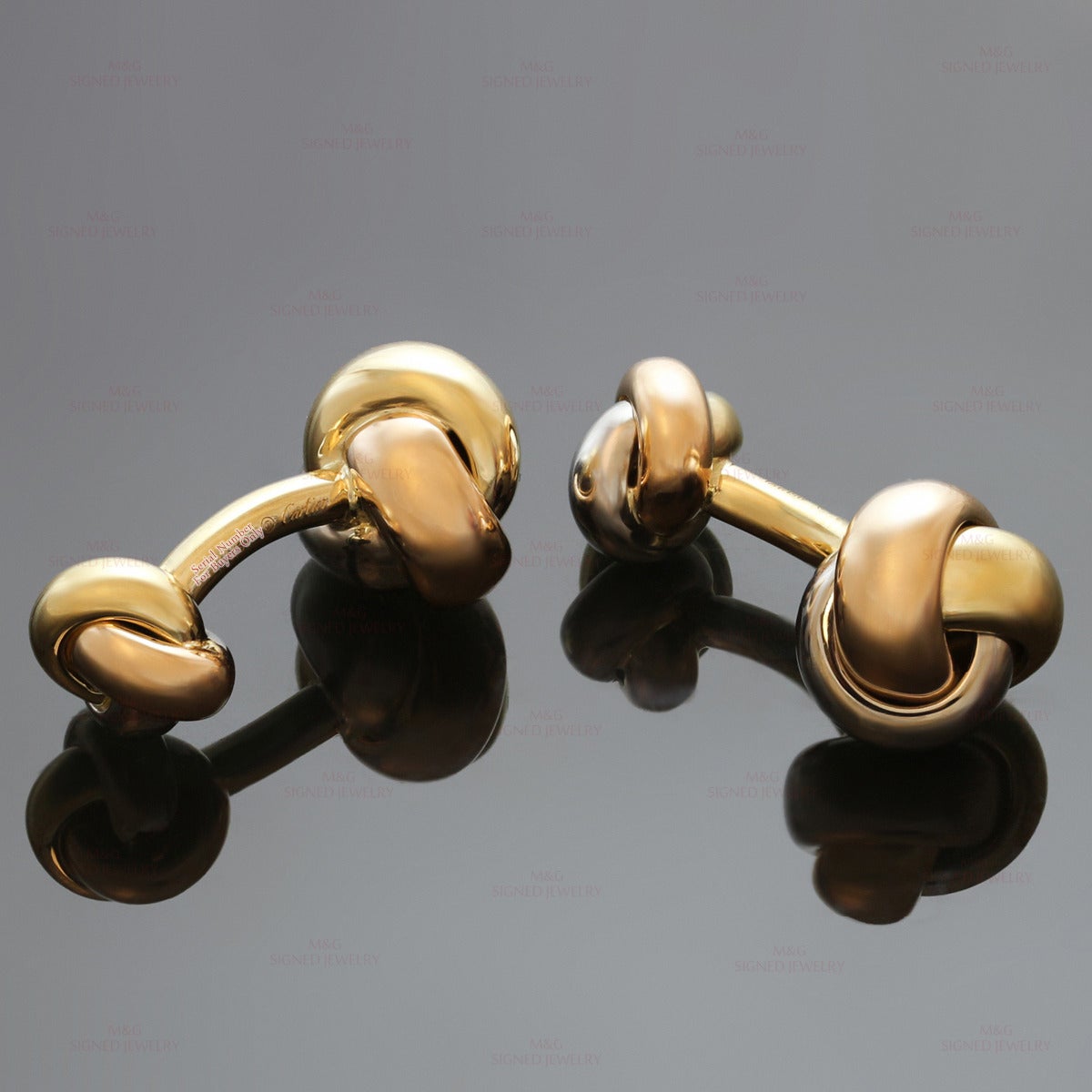 Cartier, boutons de manchette Trinity nœud classique en or tricolore Excellent état - En vente à New York, NY
