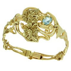 Bracelet floral en or et topaze bleue