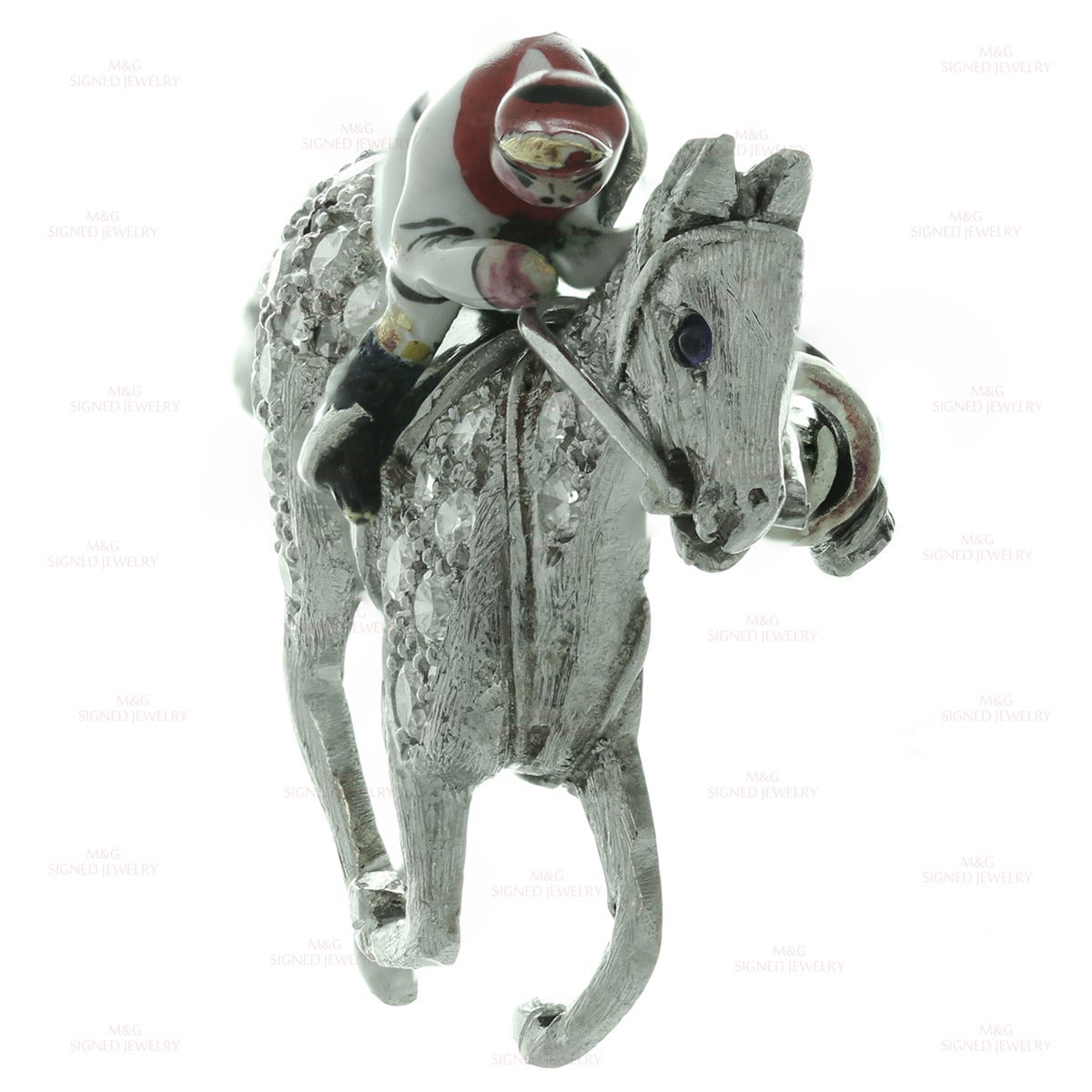 This rare art deco Cartier brooch is made in fine platinum and features a finely crafted galloping horse pave-set with approximately 27 full-cut and 8 rose-cut diamonds of an estimated 0.95 carats and accented with blue cabochon sapphire eye. A