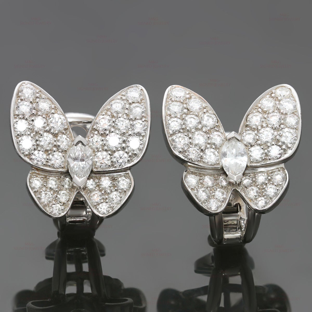 These delicate and sparkling Van Cleef & Arpels butterfly earrings are from the timeless Flying Beauties collection. Made in 18k white gold and set with a marquise-cut and brilliant-cut round E-F VVS1-VVS2 diamonds of an estimated 1.10 carats.