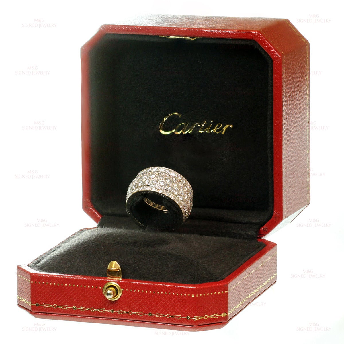 This stunning Cartier 5-row dome band from the iconic Nigeria collection is crafted in 18k white gold and pave-set with sparkling round F-G VVS2-VS1 diamonds of an estimated 5.50 carats. Made in France circa 2010s. Measurements: 0.47