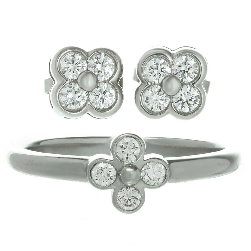 Tiffany and Co. Diamond Platinum Flower Ring and Earrings Set For Sale at  1stDibs