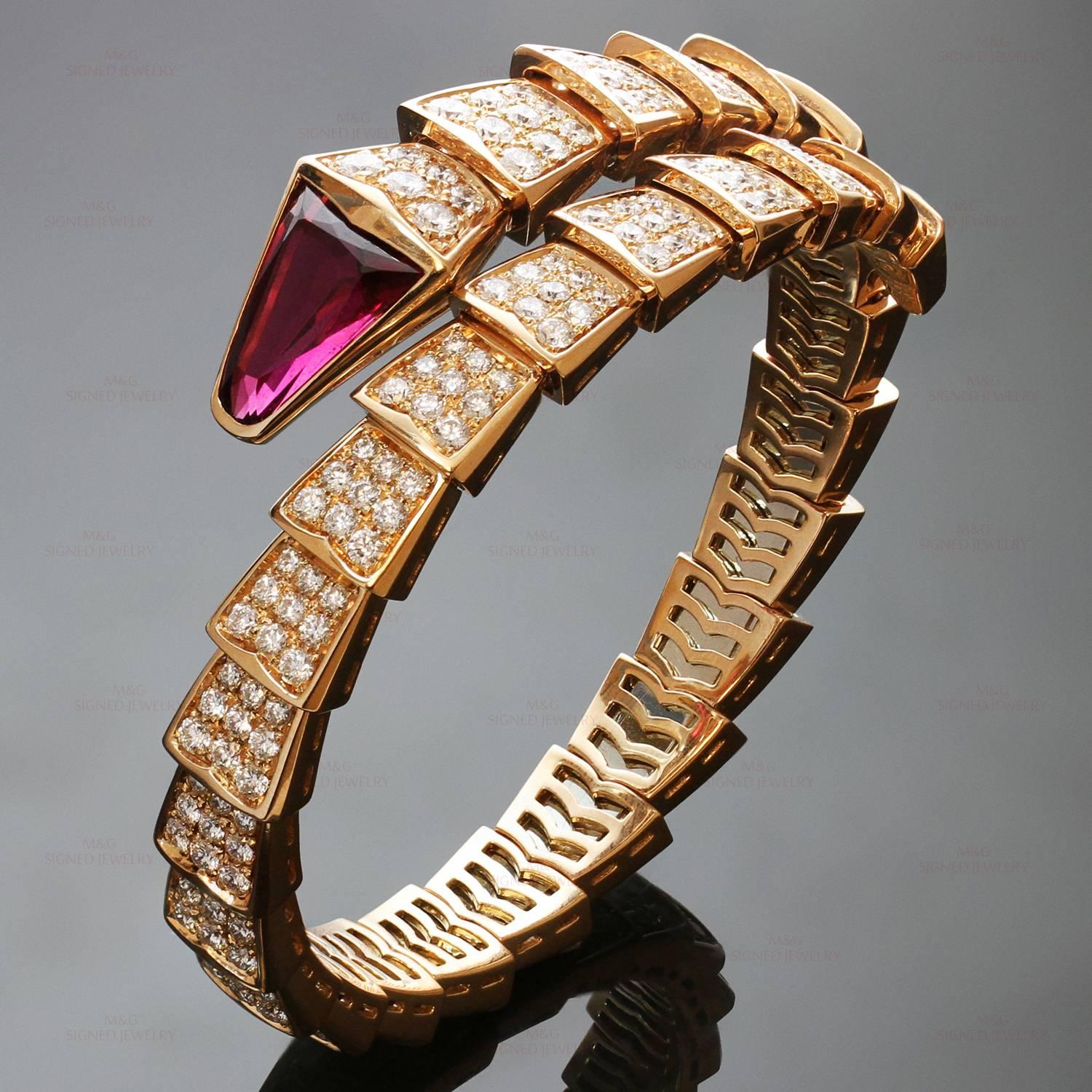 This elegant bracelet from Bulgari's Serpenti collection is crafted in 18k rose and set with a faceted rubellite stone and sparkling pave diamonds. Will fit a large wrist size of 7.5