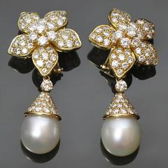 Van Cleef & Arpels Boucles d'oreilles fleur à clip en or:: perle et diamant