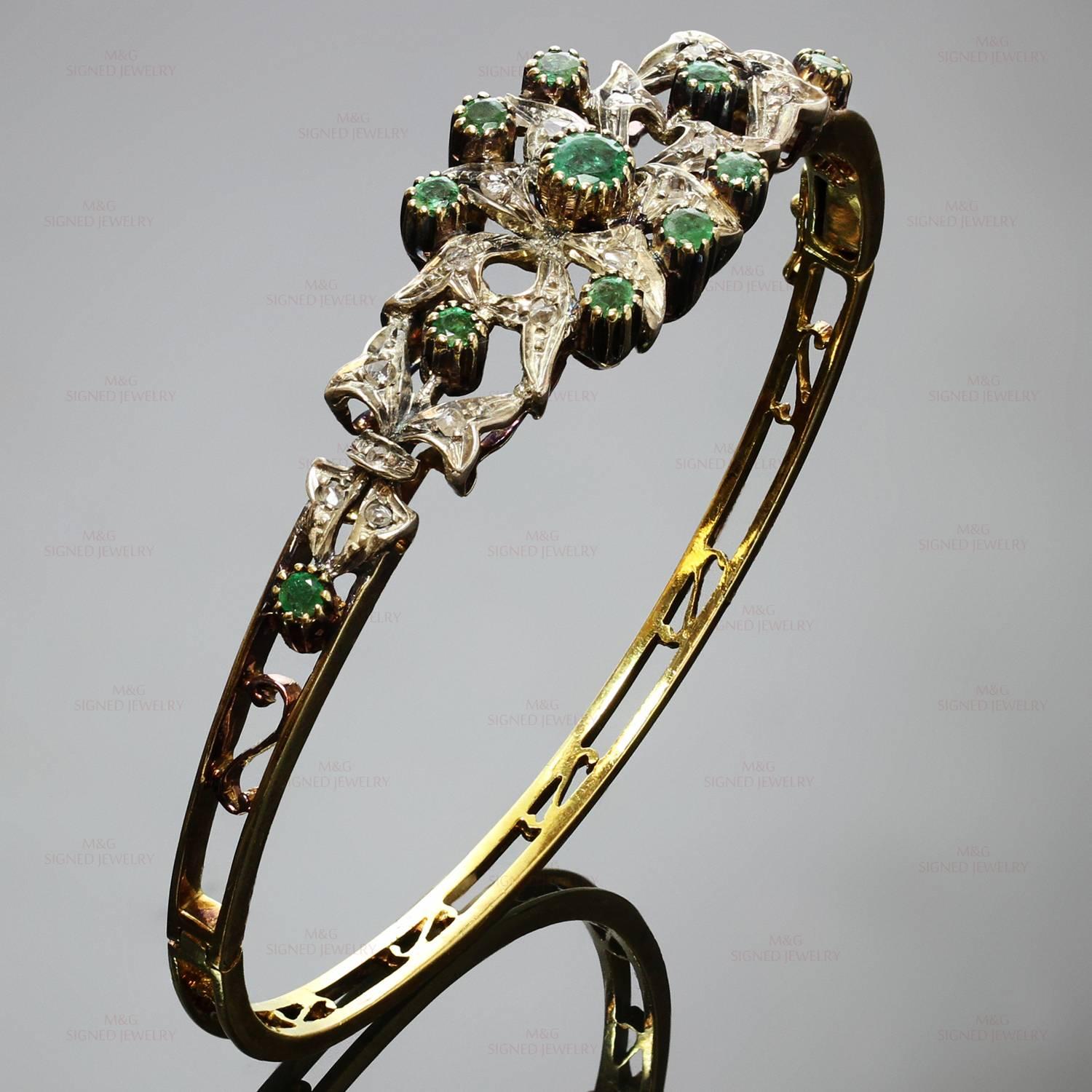 This stunning vintage bangle bracelet is crafted in 18k yellow gold and sterling silver and beautifully set with rose-cut diamonds and emeralds. Made in Italy circa 1950s. Measurements: 0.62
