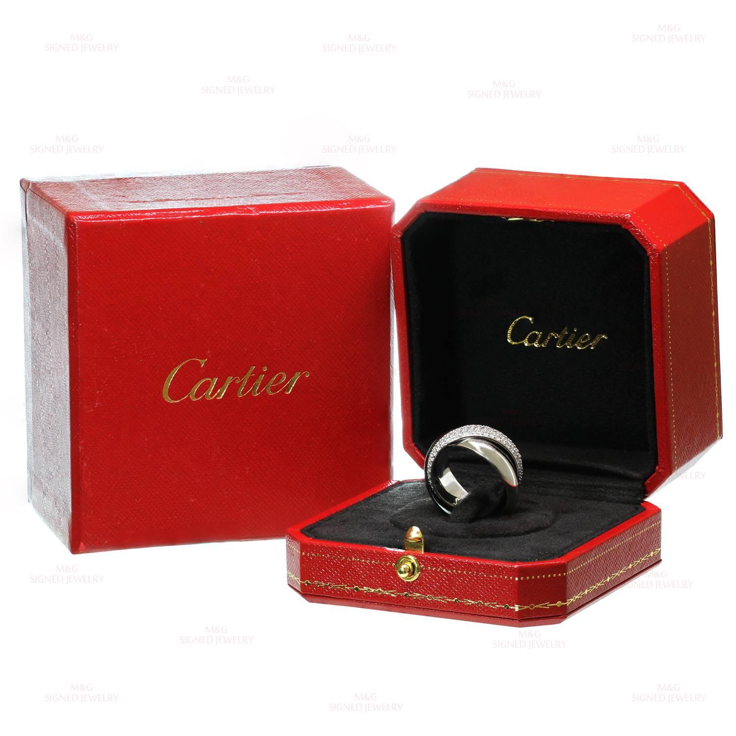 This magnificent ring from the Trinity de Cartier collection features 3 interconnected bands, crafted in 18k white gold and black ceramic and accented with round brilliant-cut diamonds of an estimated 1.60 carats. This is the large model of the
