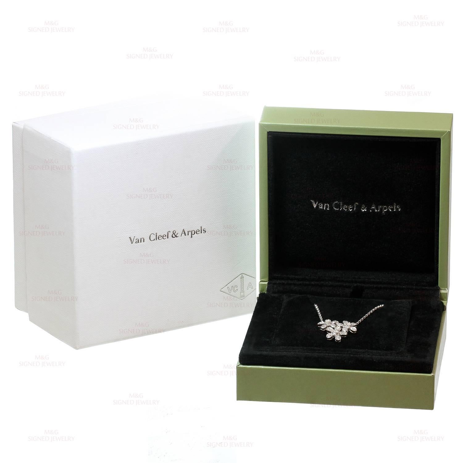 This stunning Van Cleef & Arpels necklace from the Socrate collection features a sparkling 3-flower pendant completed with a sparkling floral clasp, crafted in 18k white gold and set with brilliant-cut round diamonds of an estimated 0.90 carats, D-F