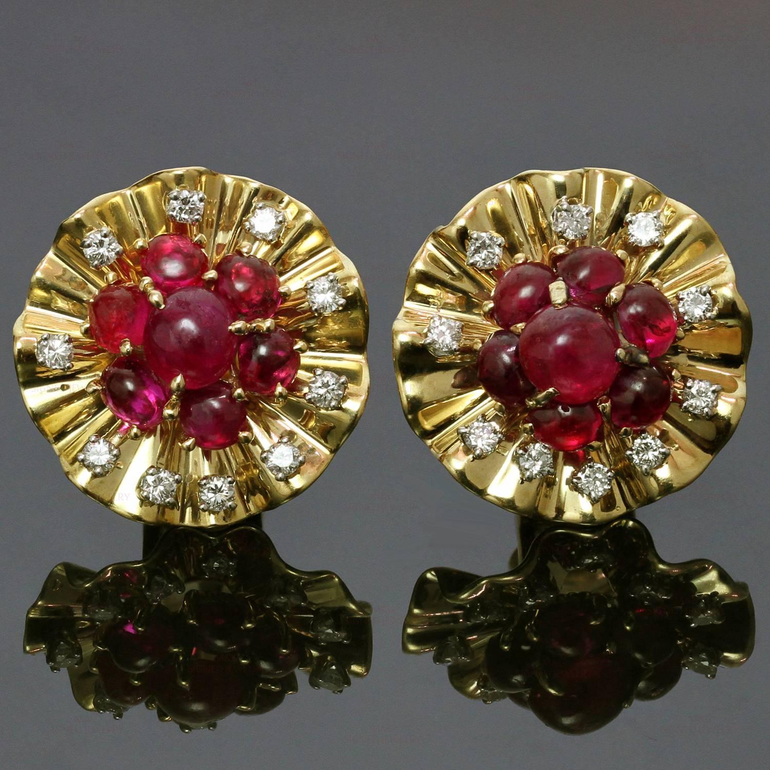These vintage Trabet & Hoeffer Mauboussin clip-on earrings feature a bright fluted design crafted in 14k yellow gold and prong-set with 14 cabochon Burmese rubies. The unheated rubies are all natural with no treatment, GIA certified. Made in United
