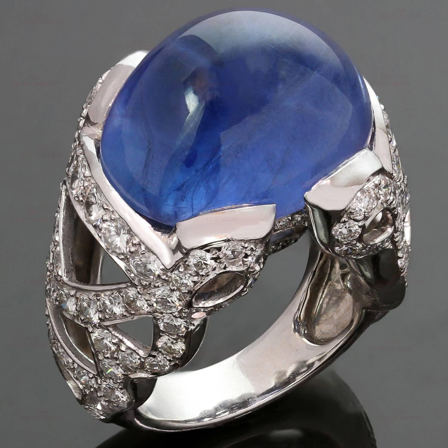 This magnificent dome ring is crafted in 18k white gold and pave-set with brilliant-cut round diamonds of an estimated 4.50 carats and a cabochon blue sapphire of an estimated 40.0 carats. All weights and measurements are approximate. Made in France