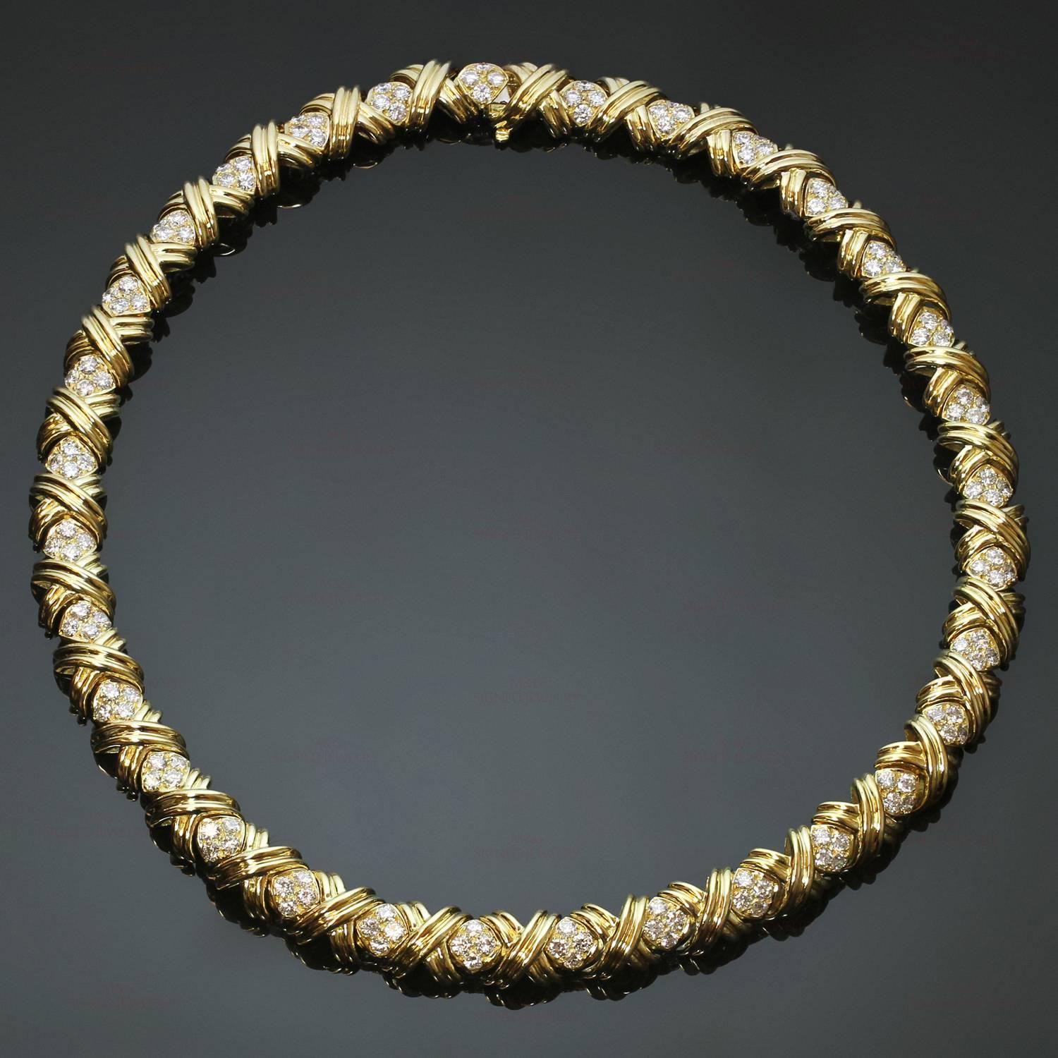 This magnificent Tiffany & Co. necklace features 32 classic X links crafted in 18k yellow gold and set with 128 brilliant-cut round diamonds of an estimated 9.6 carats. Made in United States circa 1990s. Measurements: 0.38