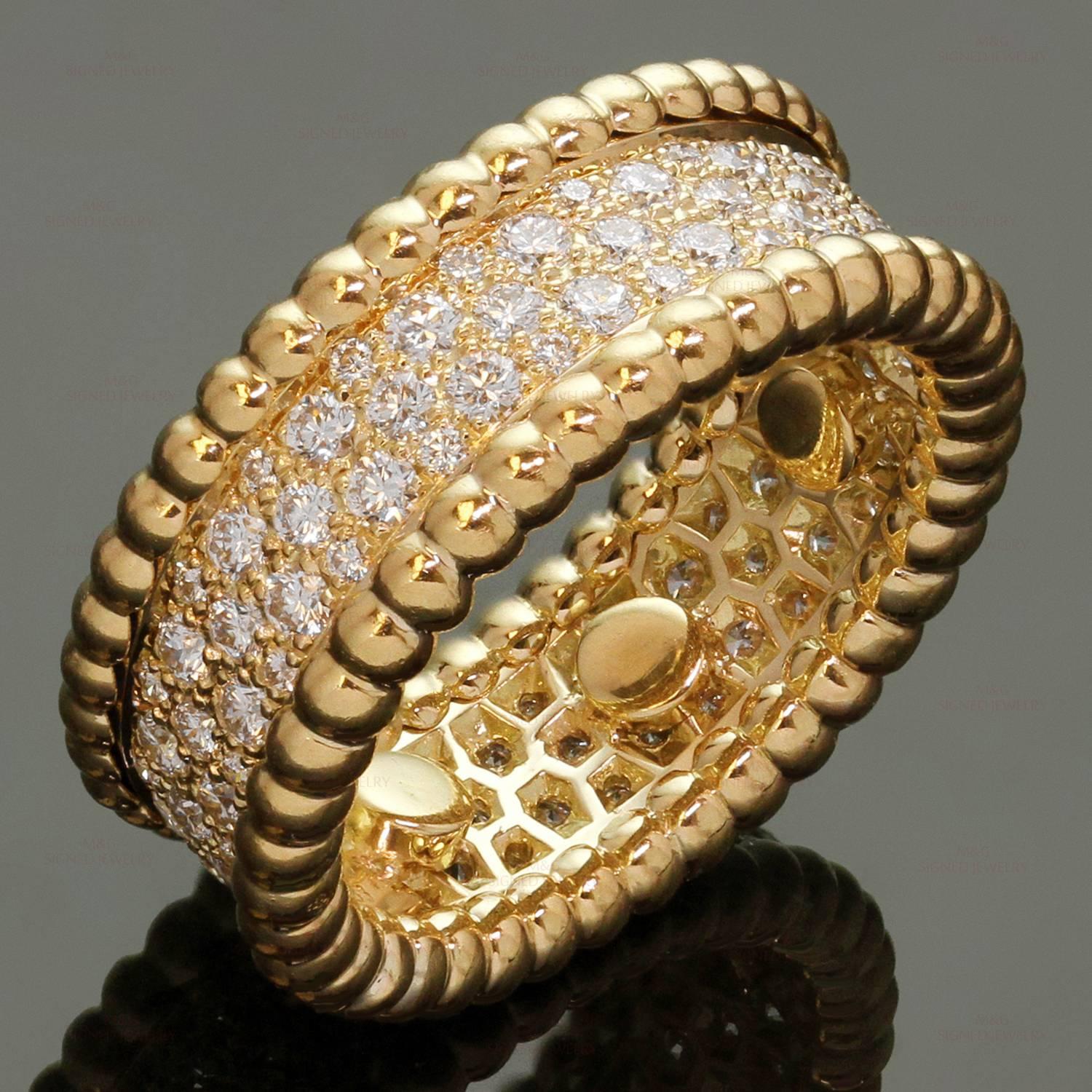 This elegant Van Cleef & Arpels band from the classic Perlée collection is crafted in 18k yellow gold and pave-set with brilliant-cut round diamonds of an estimated 1.22 carats. The ring size is 51 - 5.5 but can be adjusted by removing inner