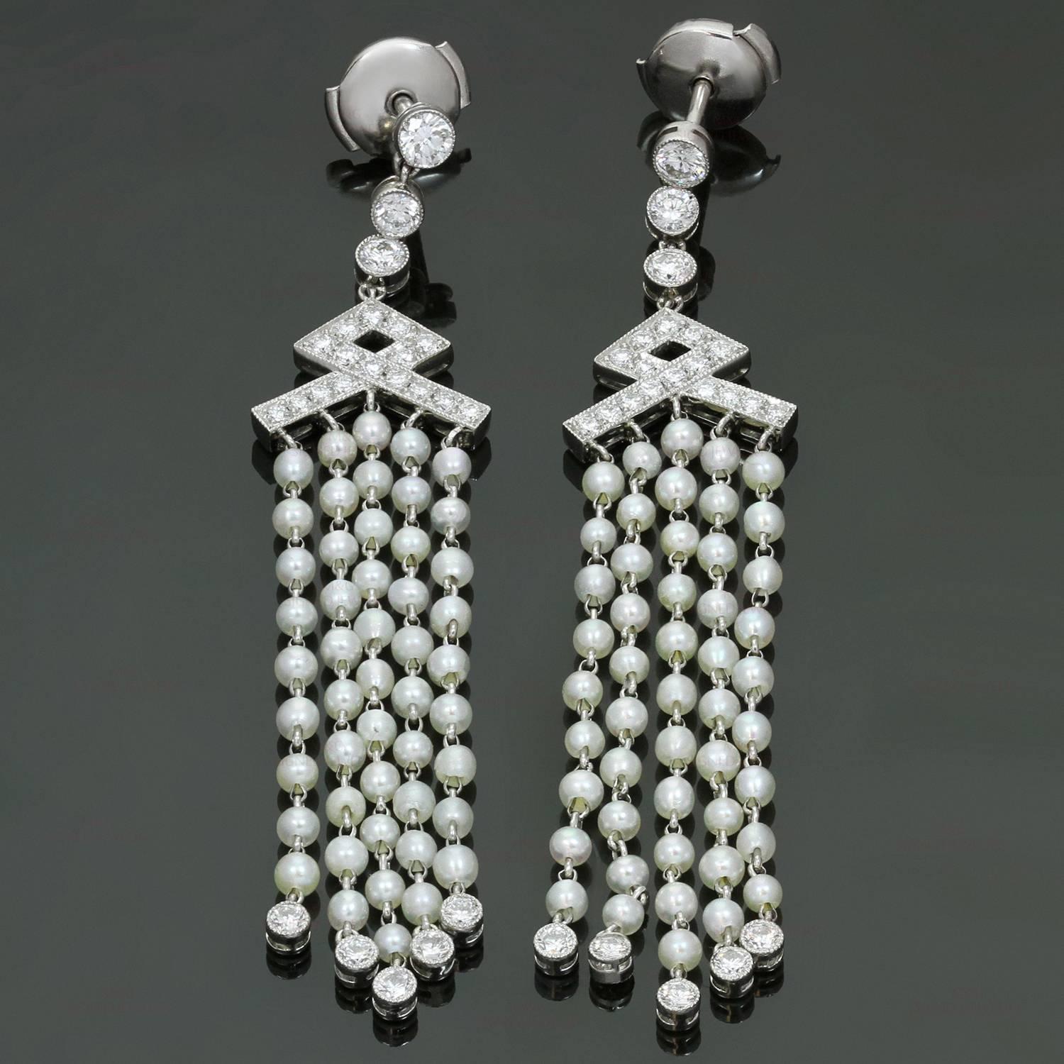 These exquisite Tiffany earrings feature natural seed pearls set in platinum and accented with round brilliant-cut diamonds of an estimated 1.20 carats. Named seed pearls are called so because of their diminutive size, and these lustrous natural