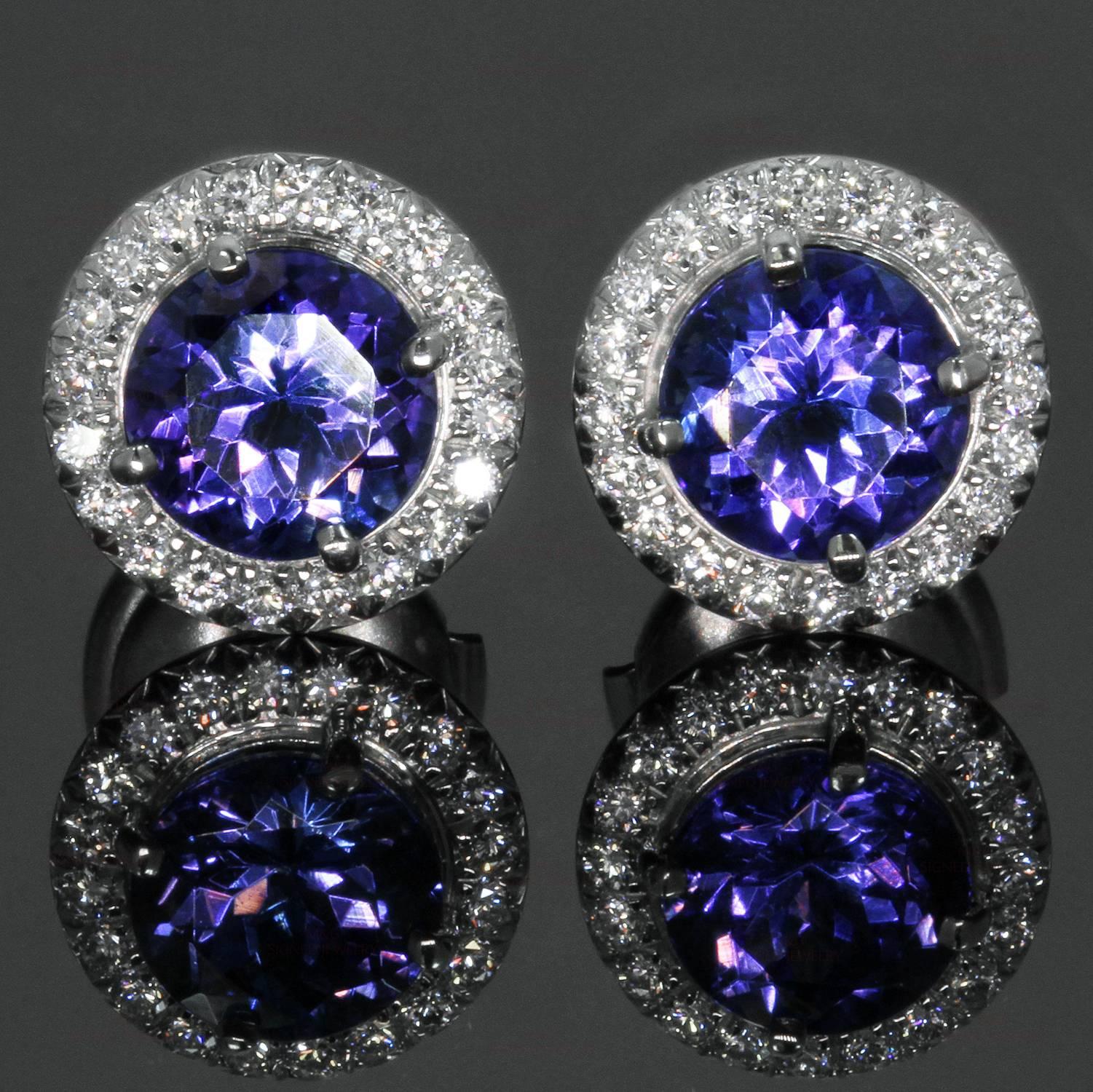 These exquisite stud earrings from Tiffany's Seleste collection are crafted in platinum and set dazzling tanzanites of an estimated 1.40 carats surrounded by brilliant-cut round diamonds of an estimated 0.20 carats. Made in United States circa