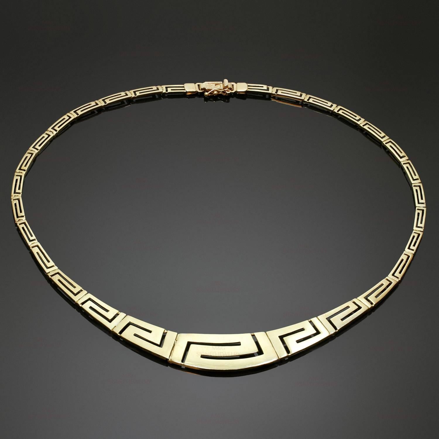 This elegant necklace is crafted in 14k yellow gold and features geometric links in a combination of satin and polished finishes. Made in Greece circa 1990s. Measurements: 0.62