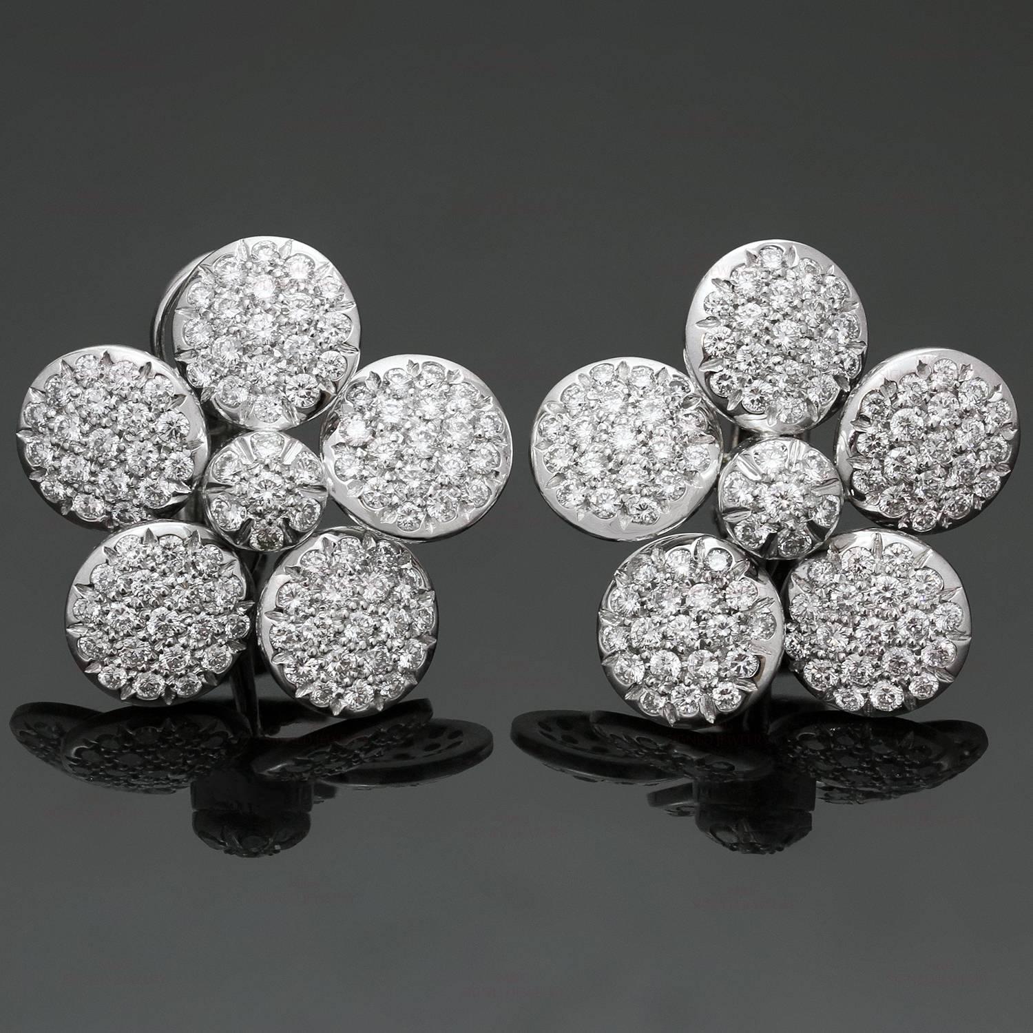 These elegant Cantamessa earrings feature a flower-shaped design crafted in 18k white gold and pave-set with an estimated 204 diamonds of an estimated 4.0 carats. These lever-back earrings are completed with collapsible posts. Made in Italy circa