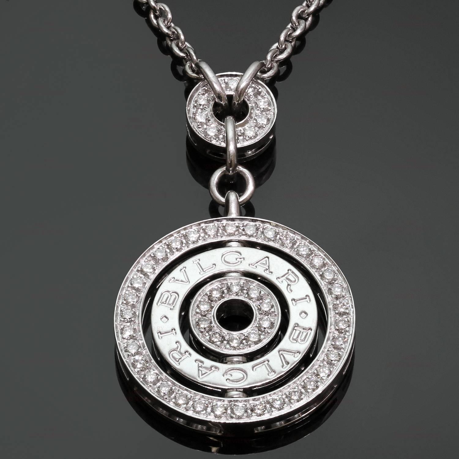 This fabulous Bulgari necklace from the Cerchi collection is crafted in 18k white gold and completed with a circular pendant engraved with the Bvlgari name and set with 56 round brilliant-cut diamonds of an estimated 0.80 carats. The chain has an