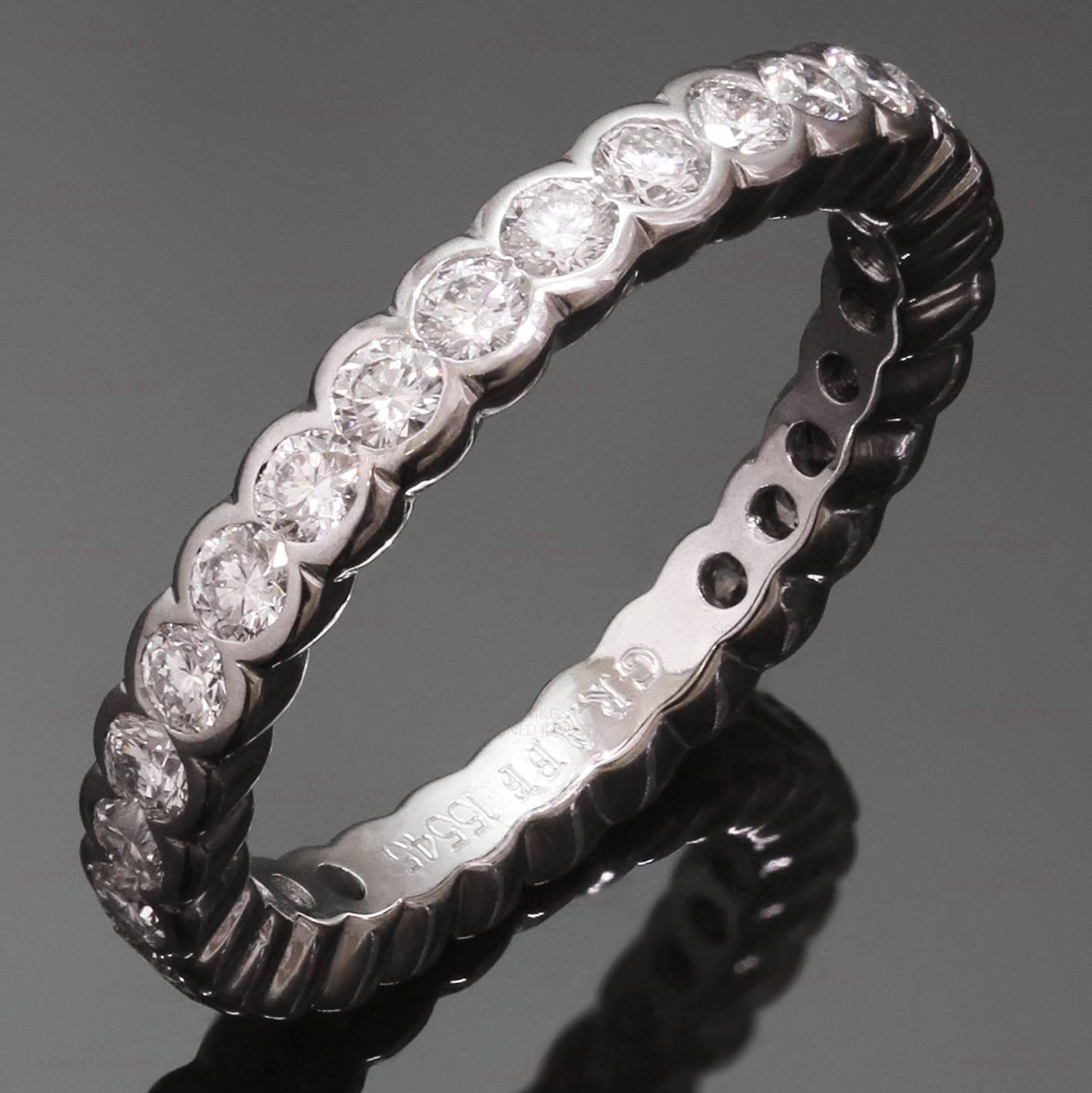 This classic Graff eternity band from the elegant Scallop collection is crafted in 18k white gold and set with round brilliant-cut diamonds of an estimated 1.20 carats. Made in United Kingdom circa 2010s. Measurements: 0.11" (3mm) width. The